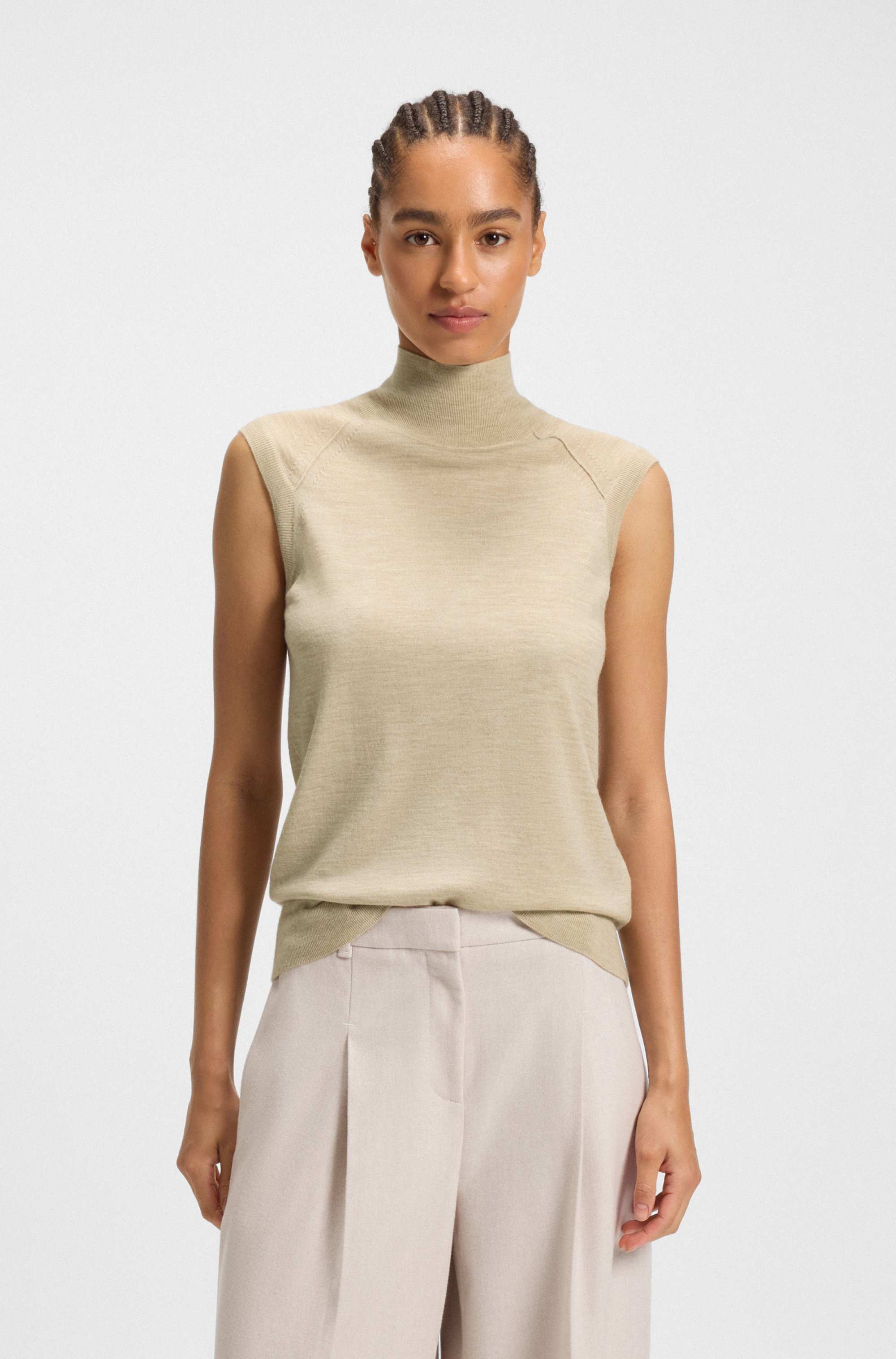 Sleeveless top in merino wool with mock neckline