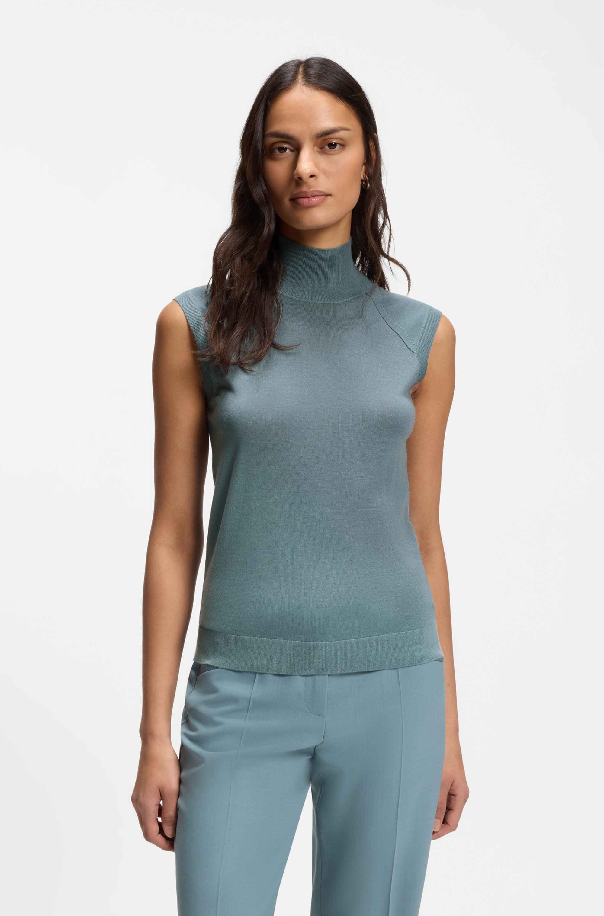 Sleeveless top in merino wool with mock neckline