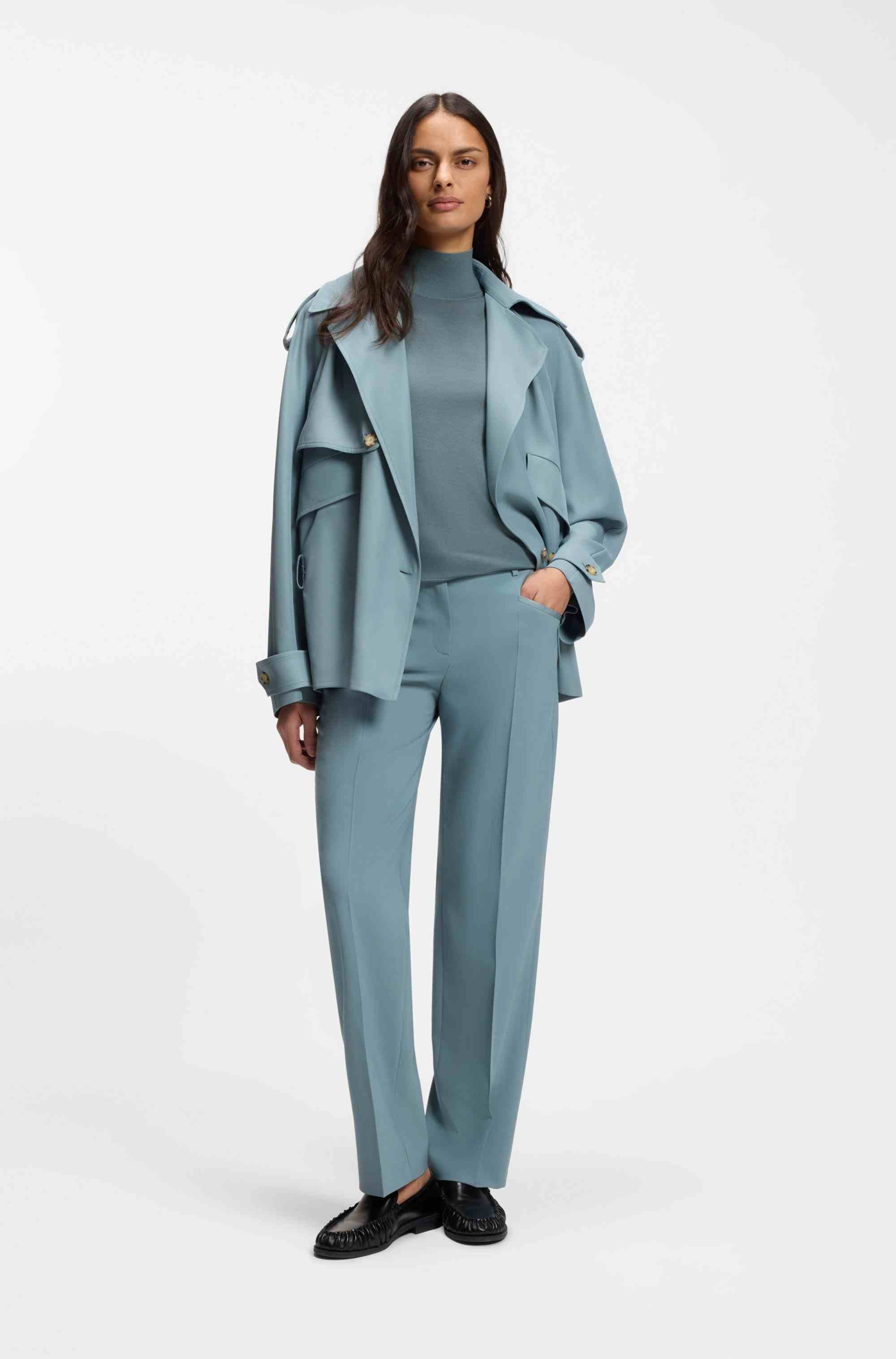 Sleeveless top in merino wool with mock neckline