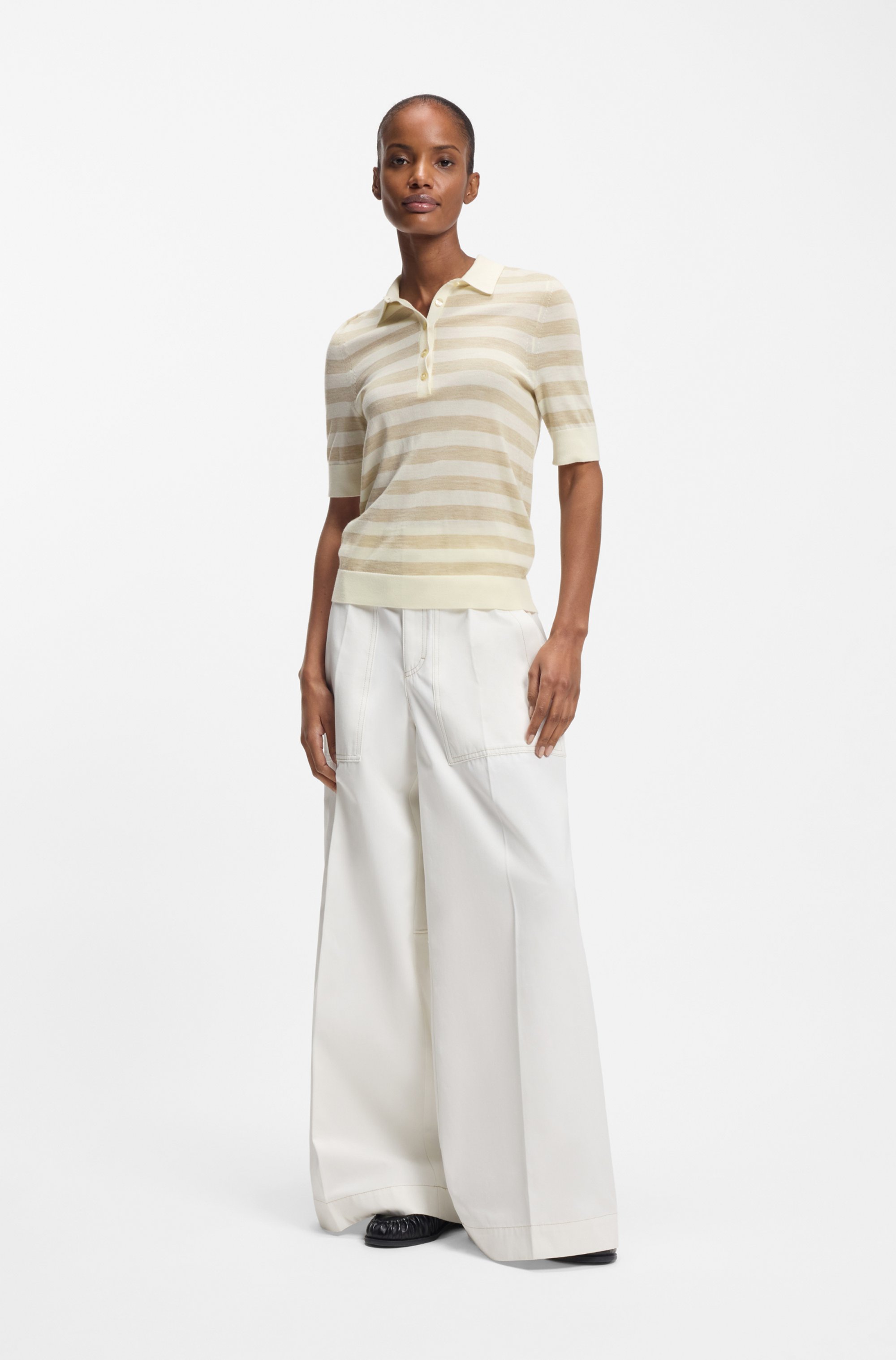 Short-sleeved sweater in merino wool with polo collar