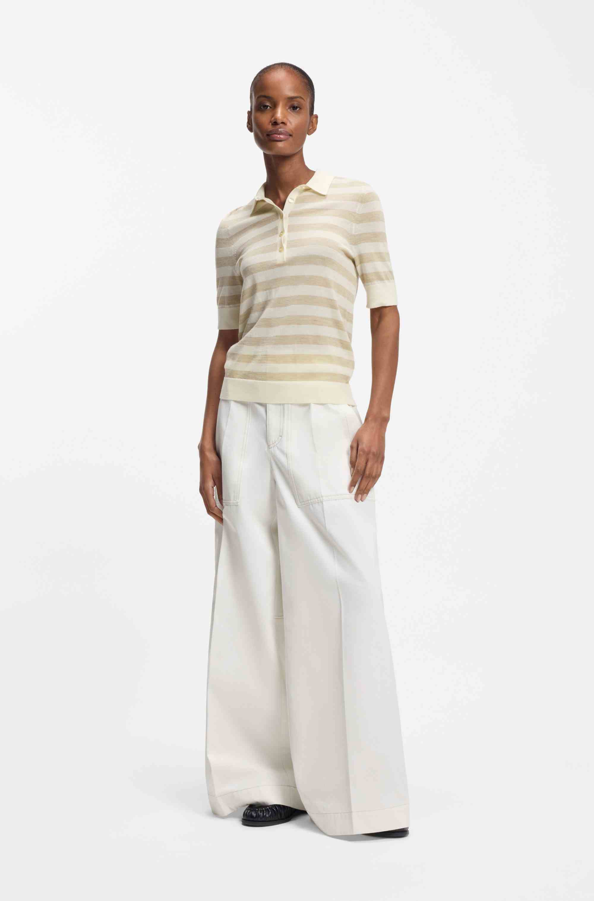 Short-sleeved sweater in merino wool with polo collar