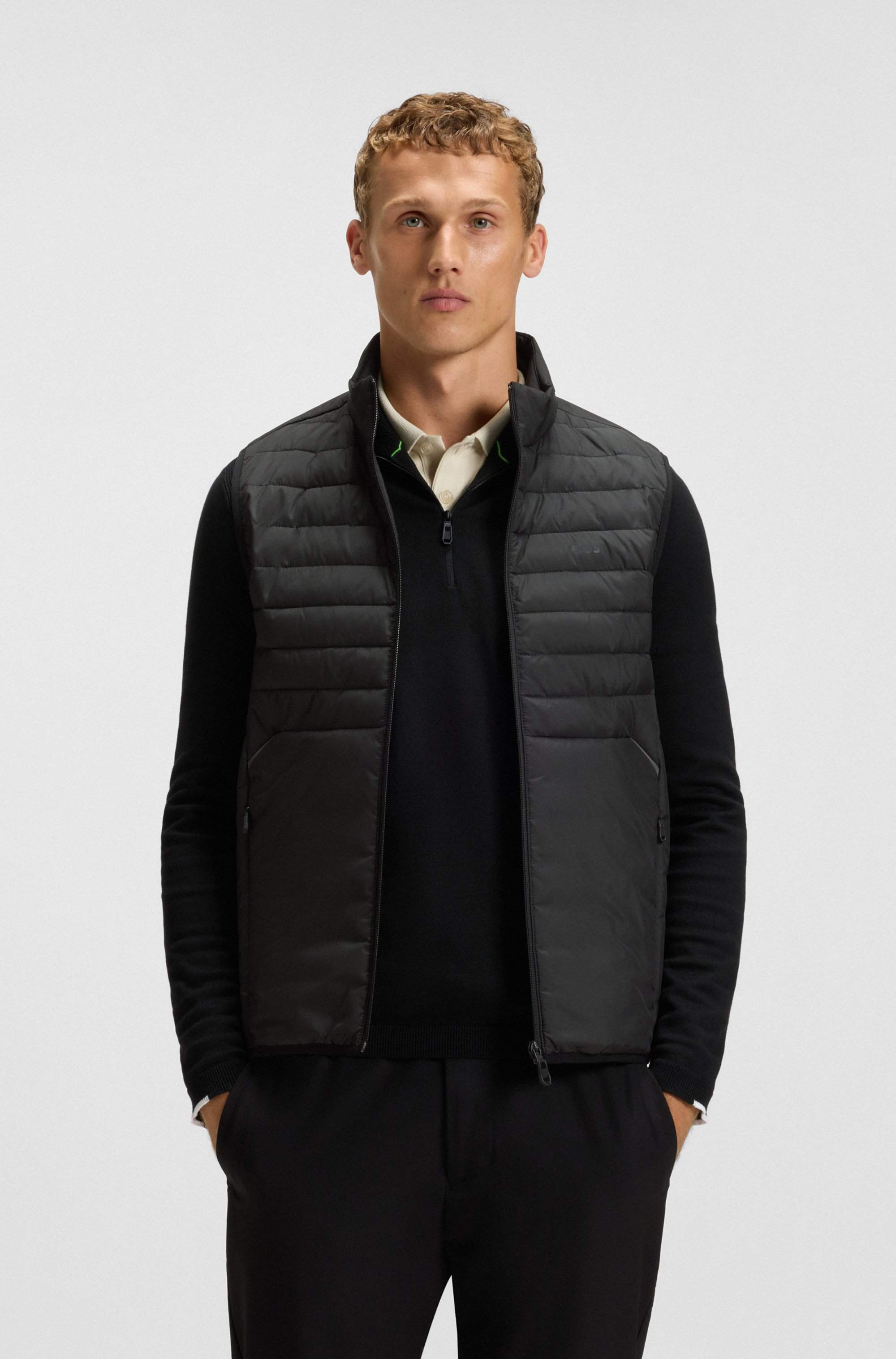 Water-repellent gilet with decorative reflective accents