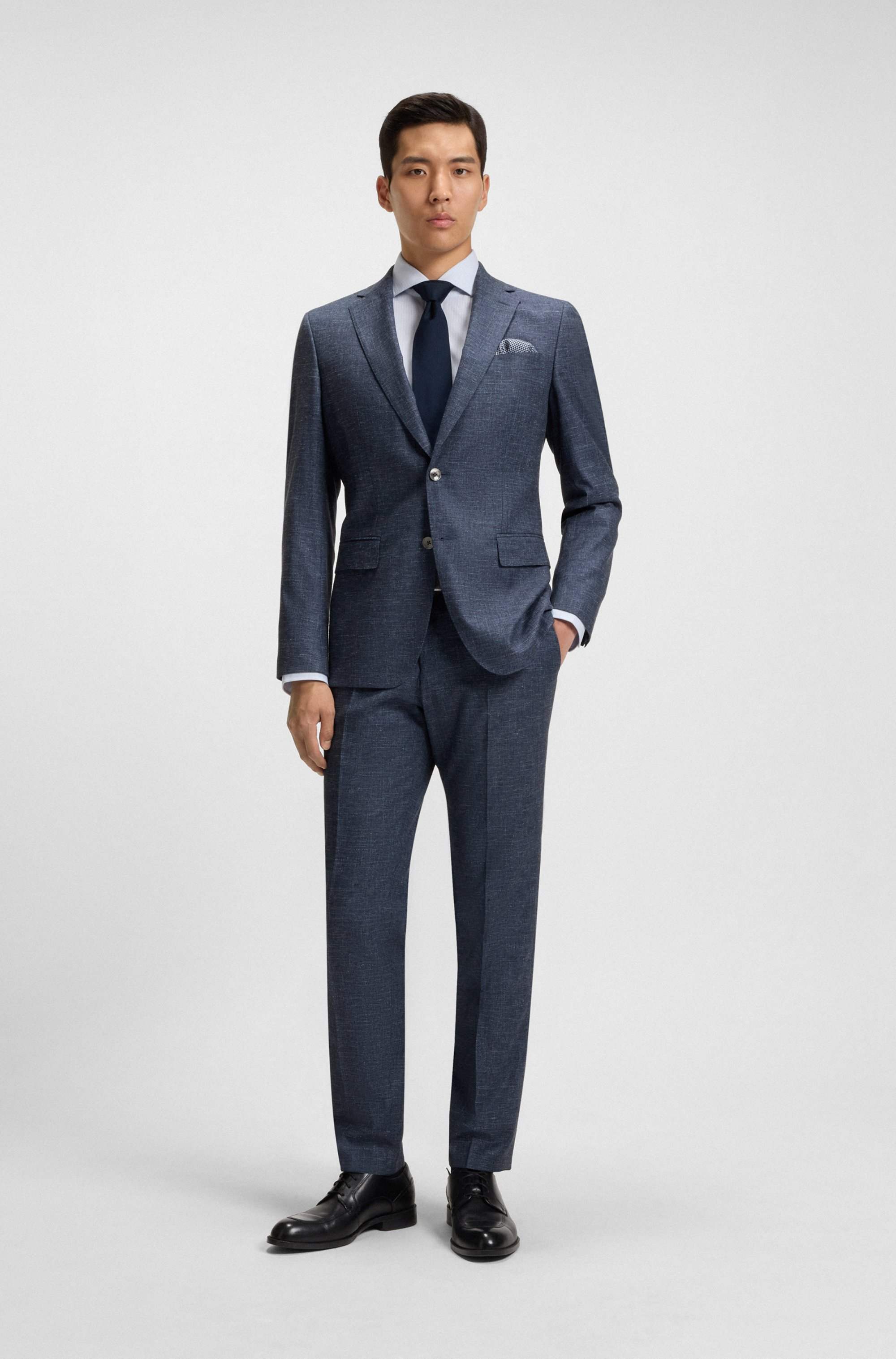 Slim-fit trousers in patterned stretch fabric