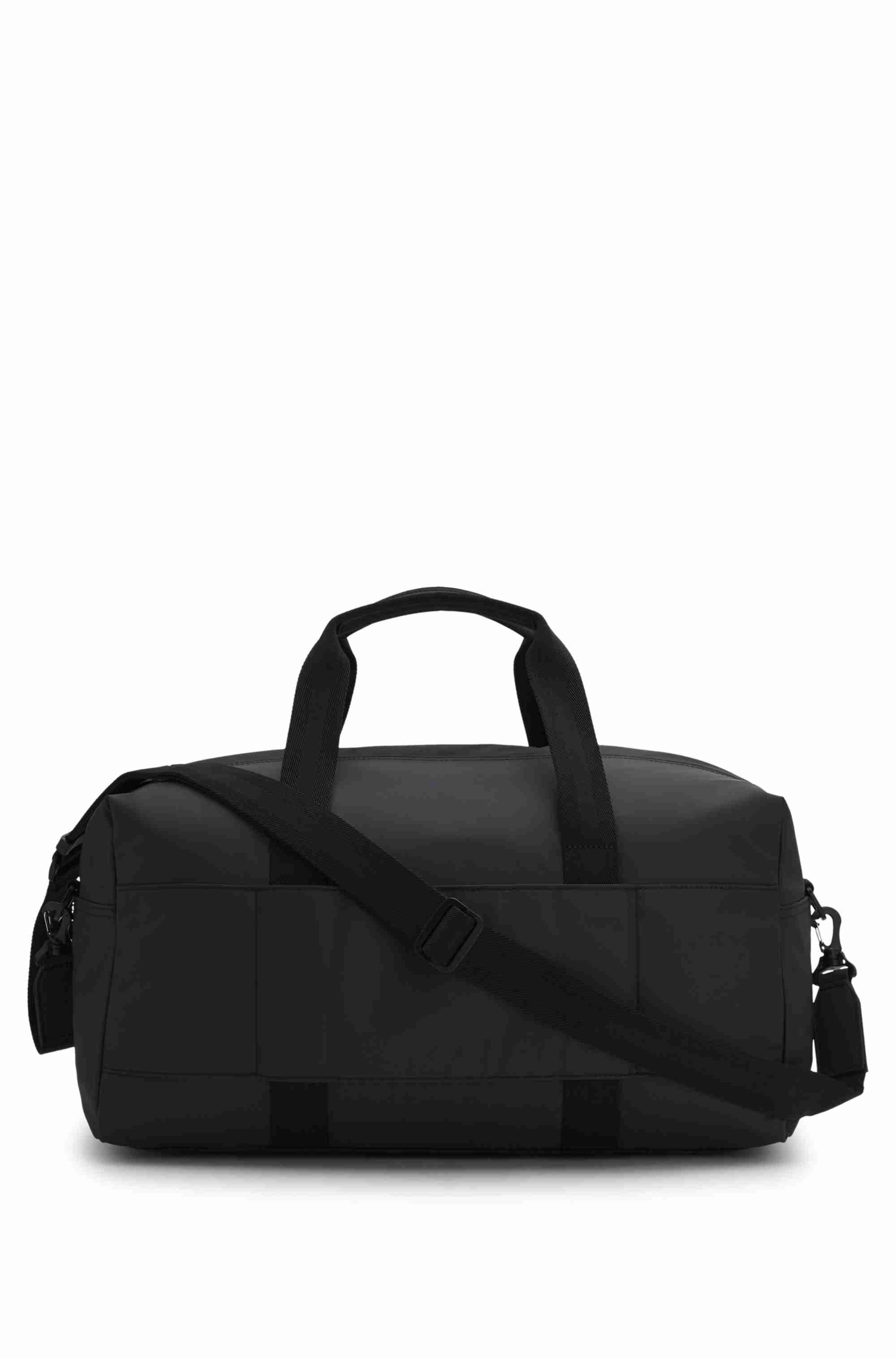 Coated-fabric holdall with logo patch