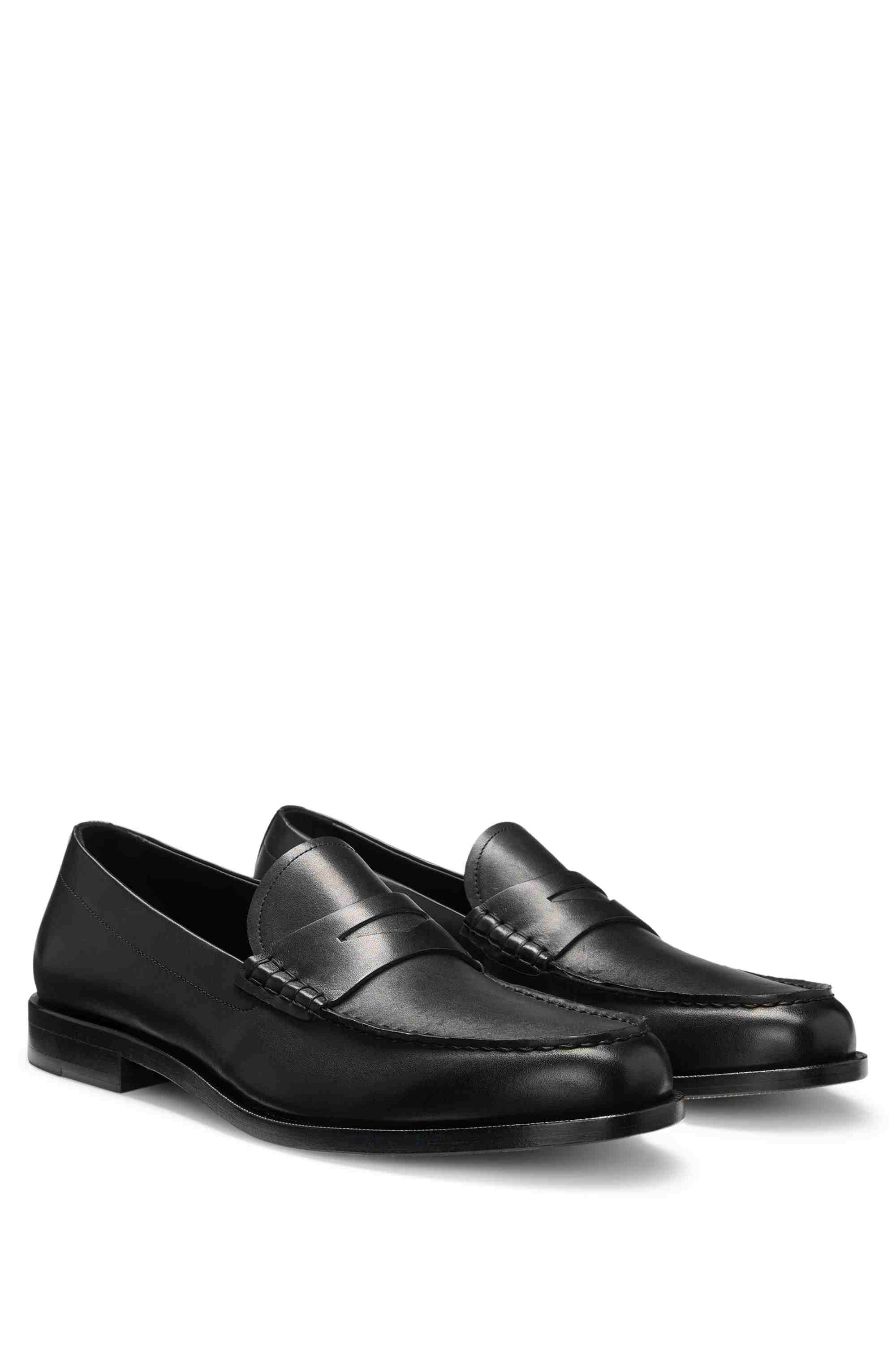 Loafers in smooth leather with penny trim