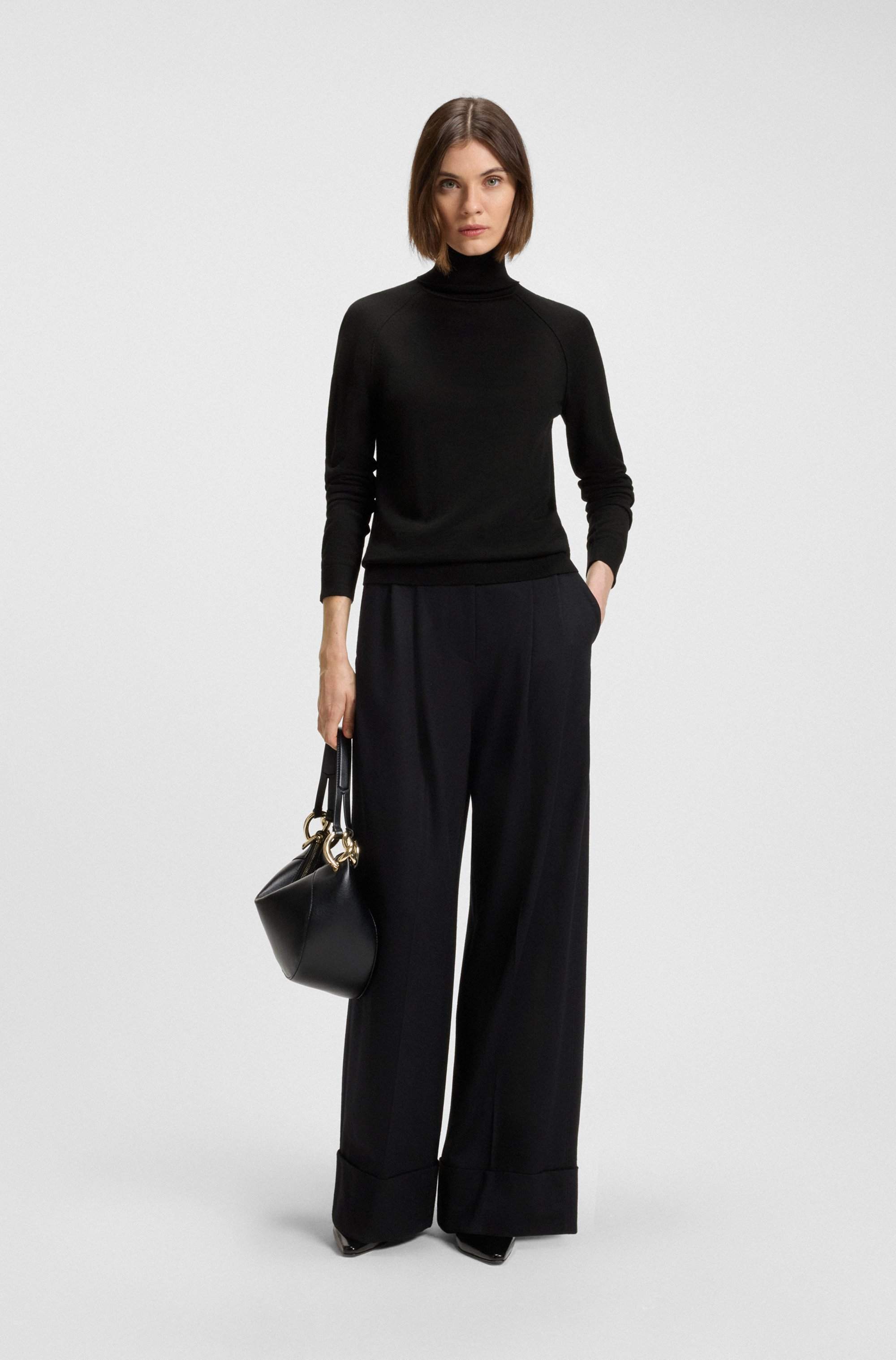 Rollneck sweater in merino wool