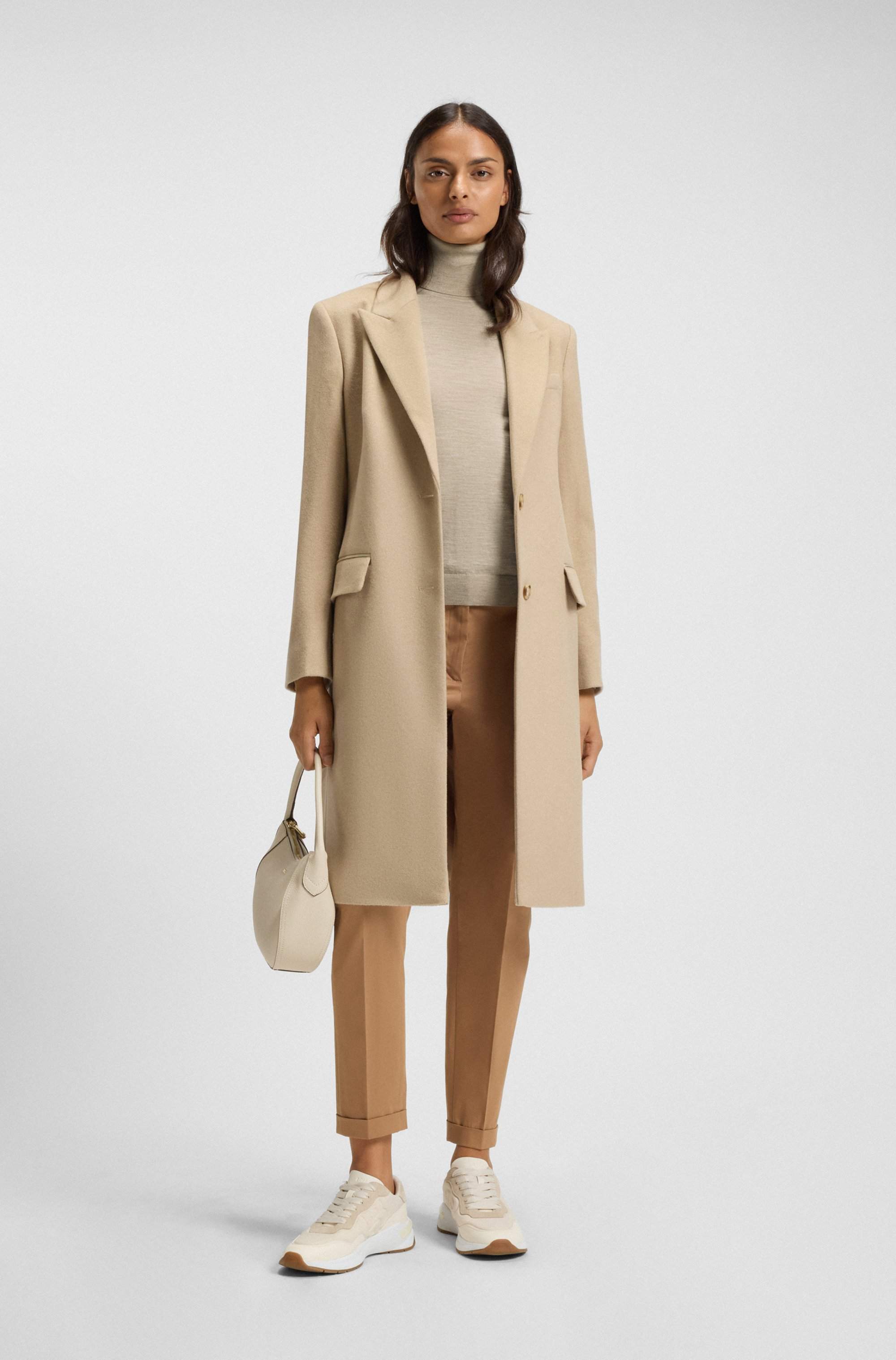 Rollneck sweater in merino wool