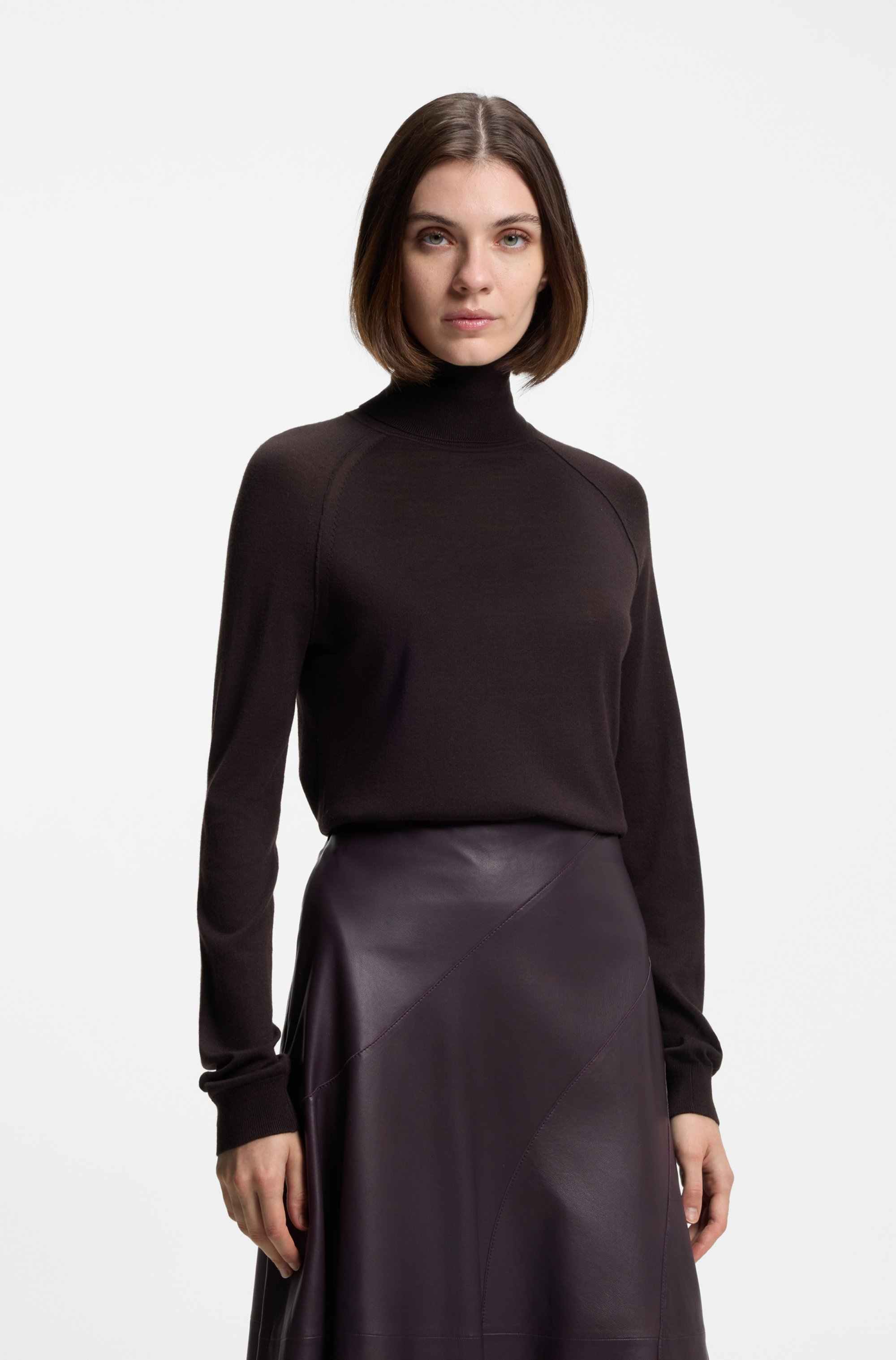 Rollneck sweater in merino wool