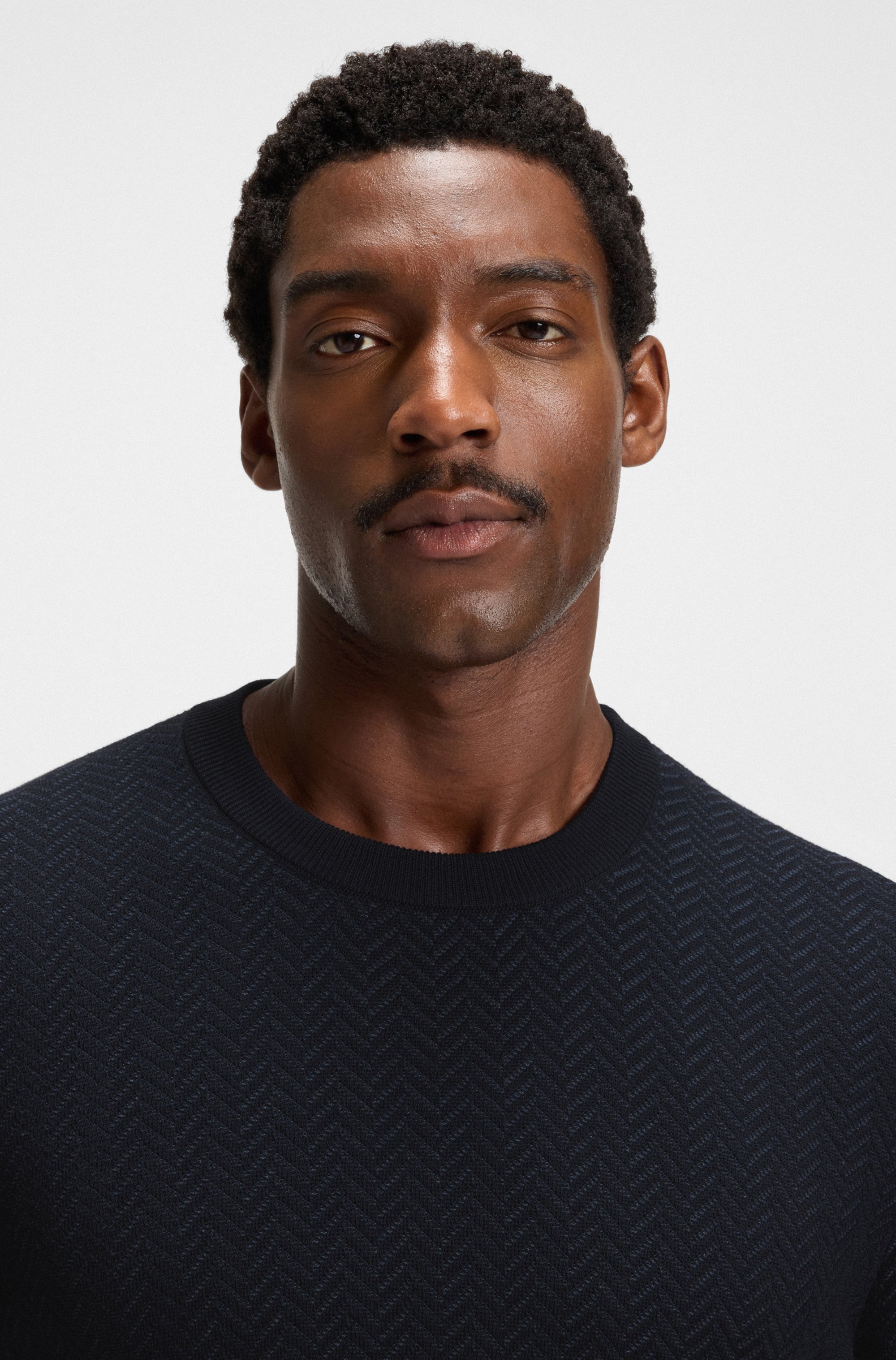 Herringbone-structured sweater in virgin wool and cotton