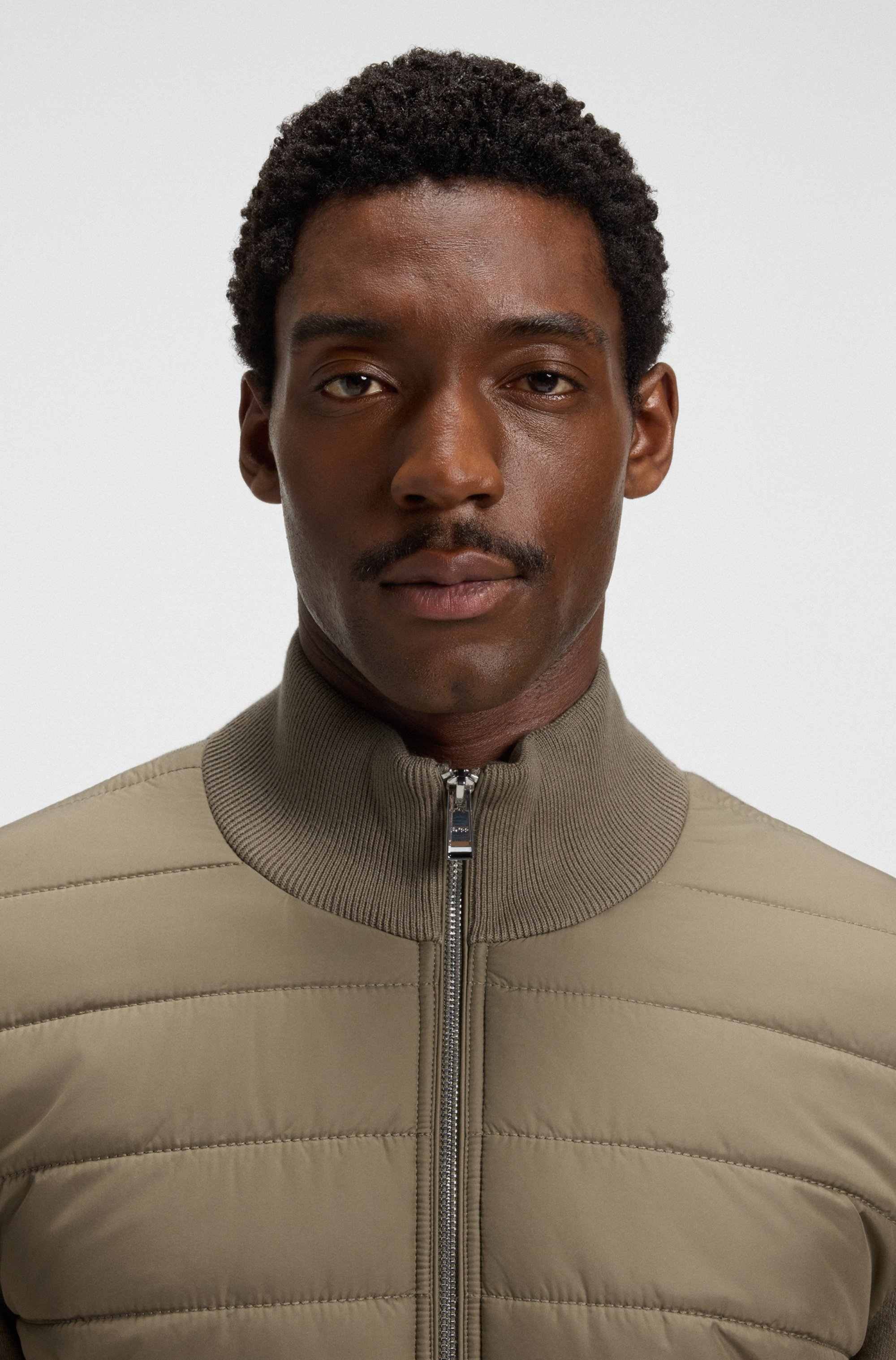 Mixed-material jacket with padded front