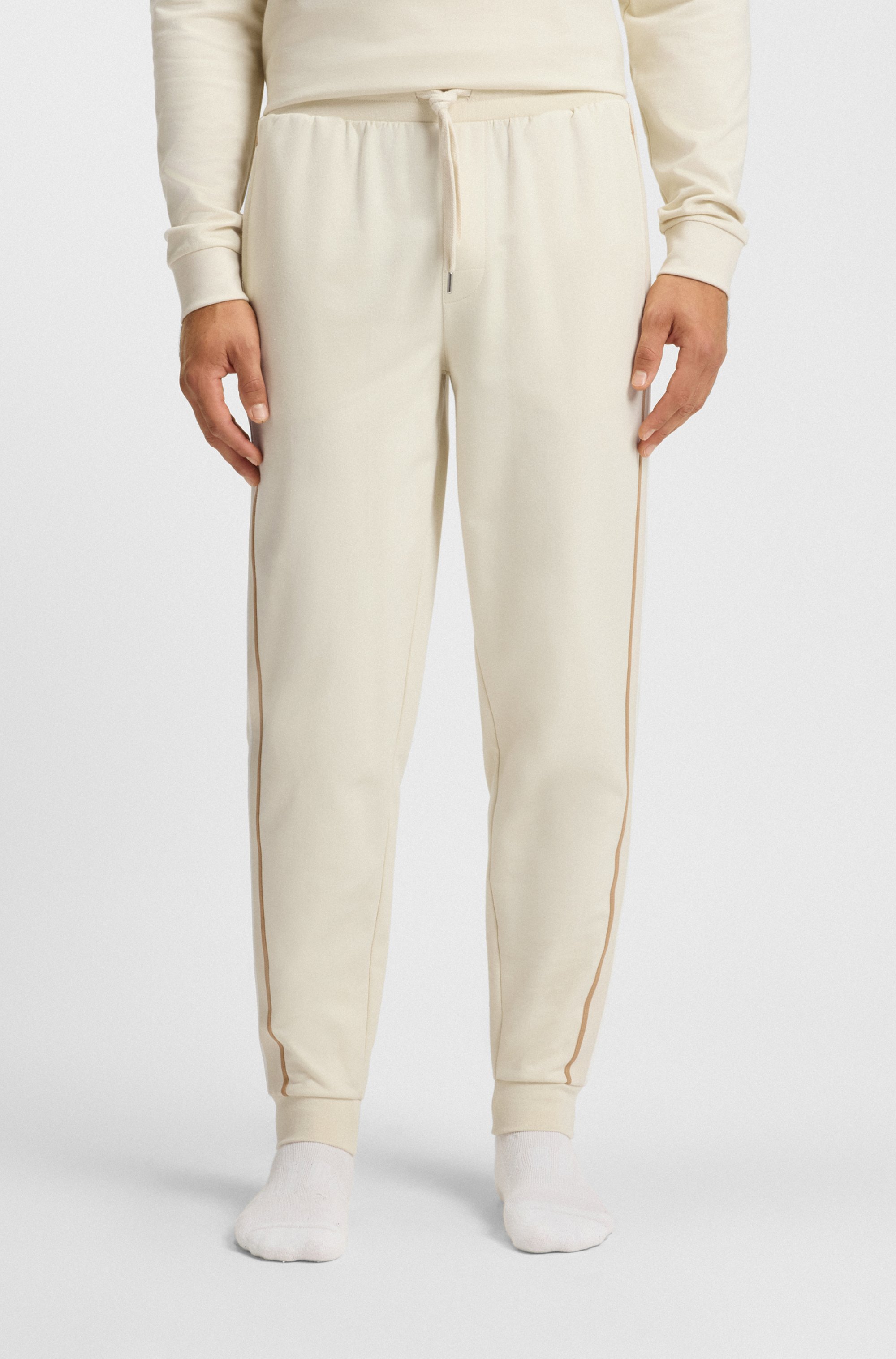 Cotton-terry tracksuit bottoms with tape and logo