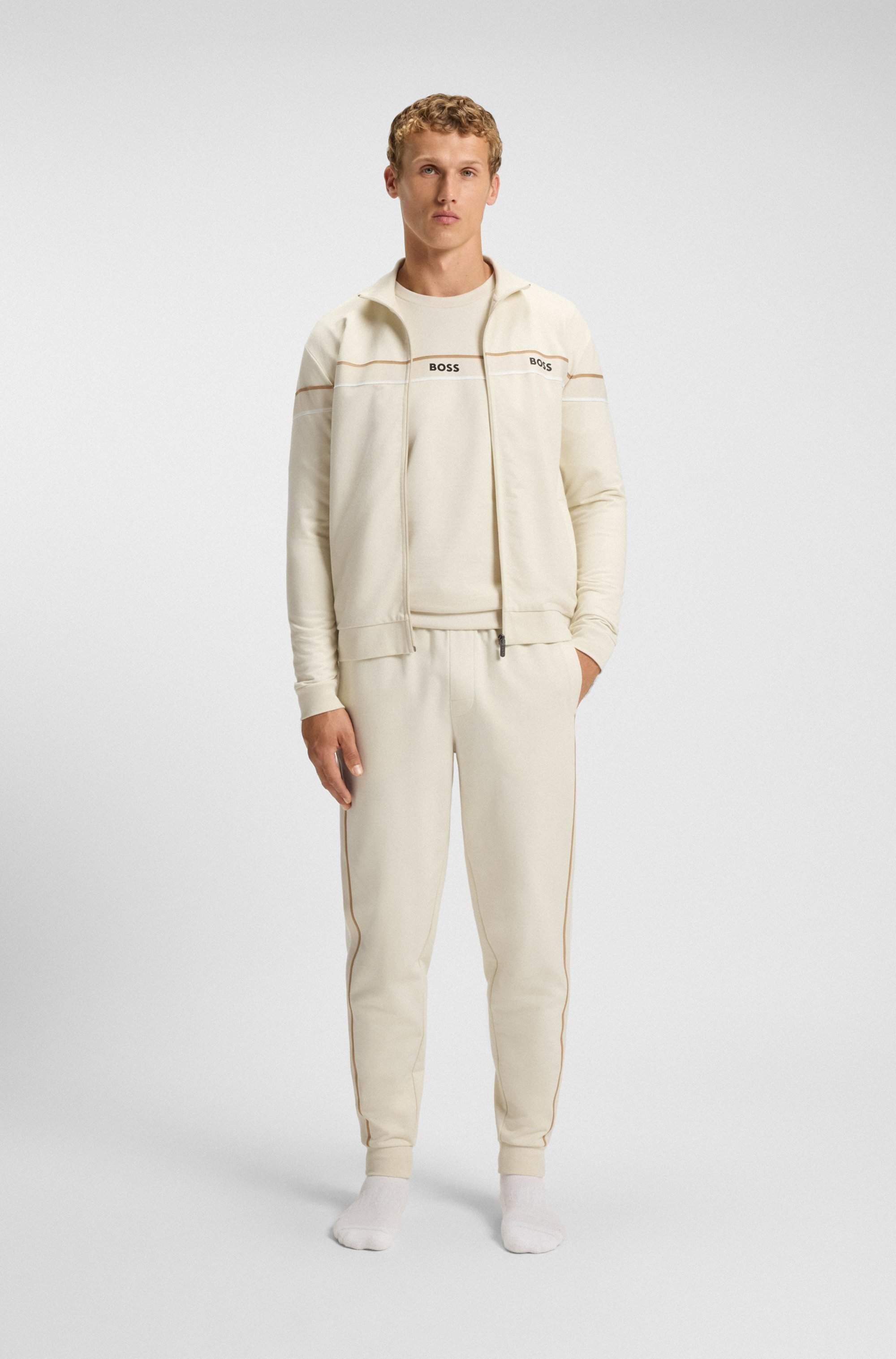 Cotton-terry tracksuit bottoms with tape and logo
