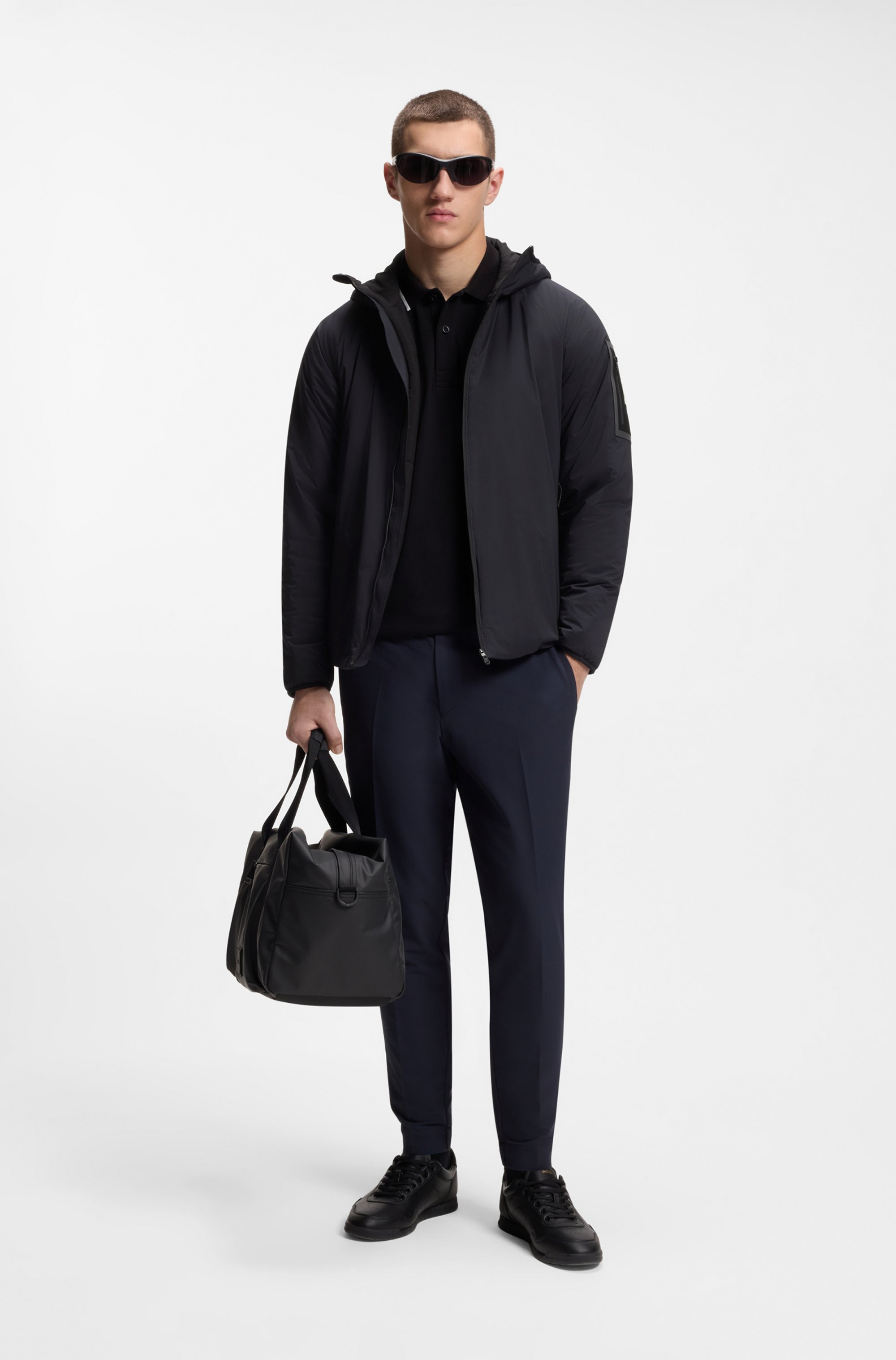 Water-repellent jacket with adjustable hem