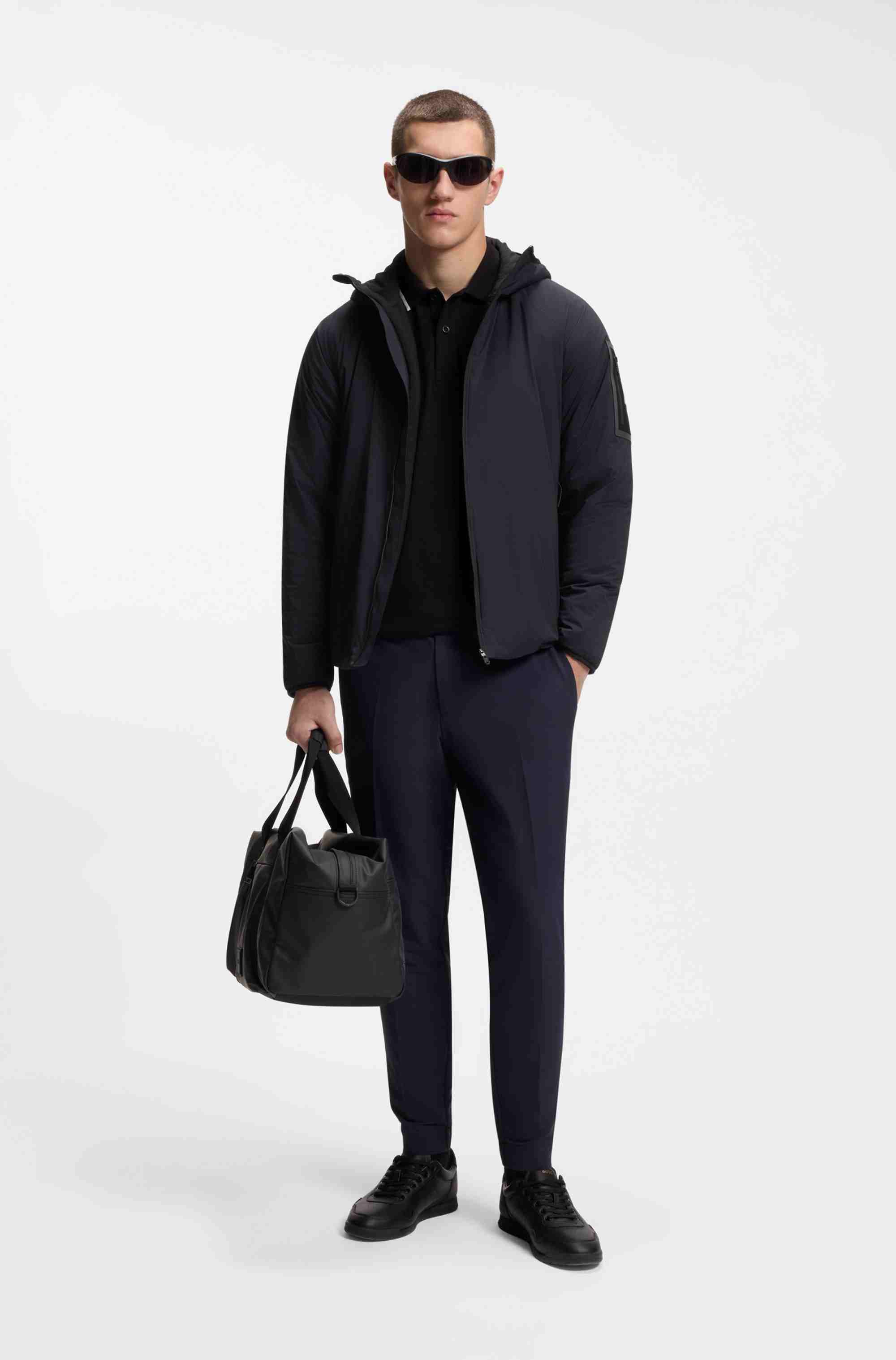 Water-repellent jacket with adjustable hem