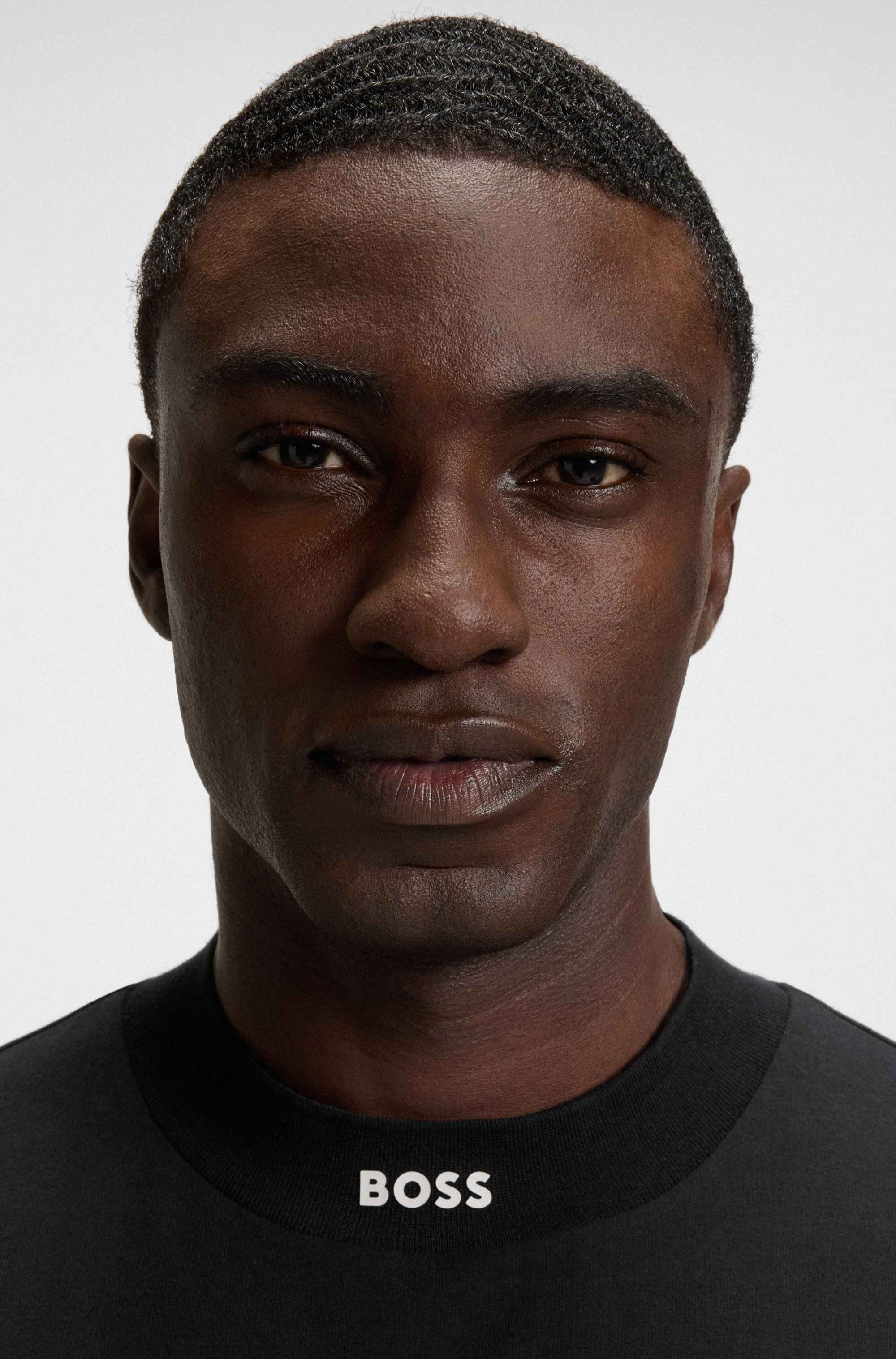 Relaxed-fit T-shirt in stretch cotton with logo collar