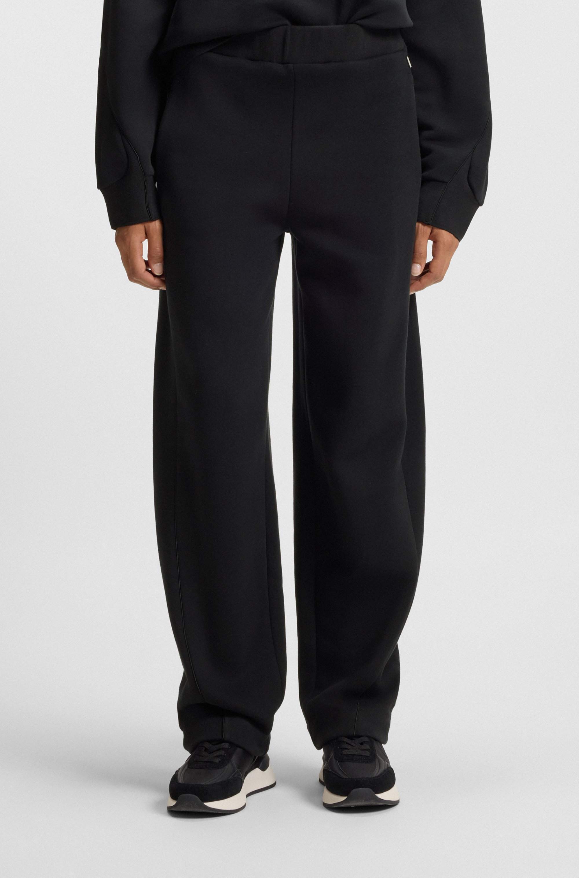 Cotton-blend tracksuit bottoms with lustrous piping