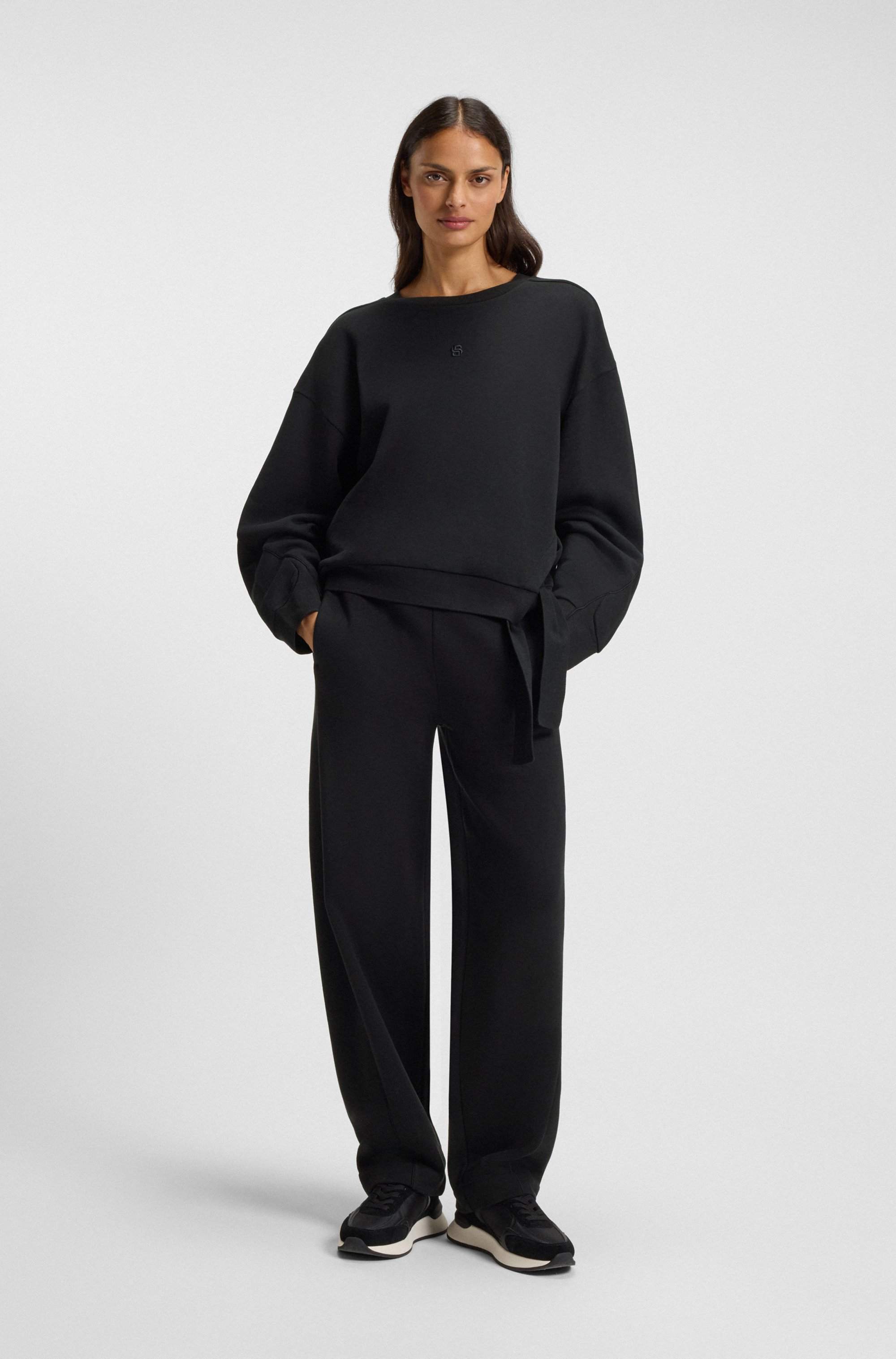 Cotton-blend tracksuit bottoms with lustrous piping