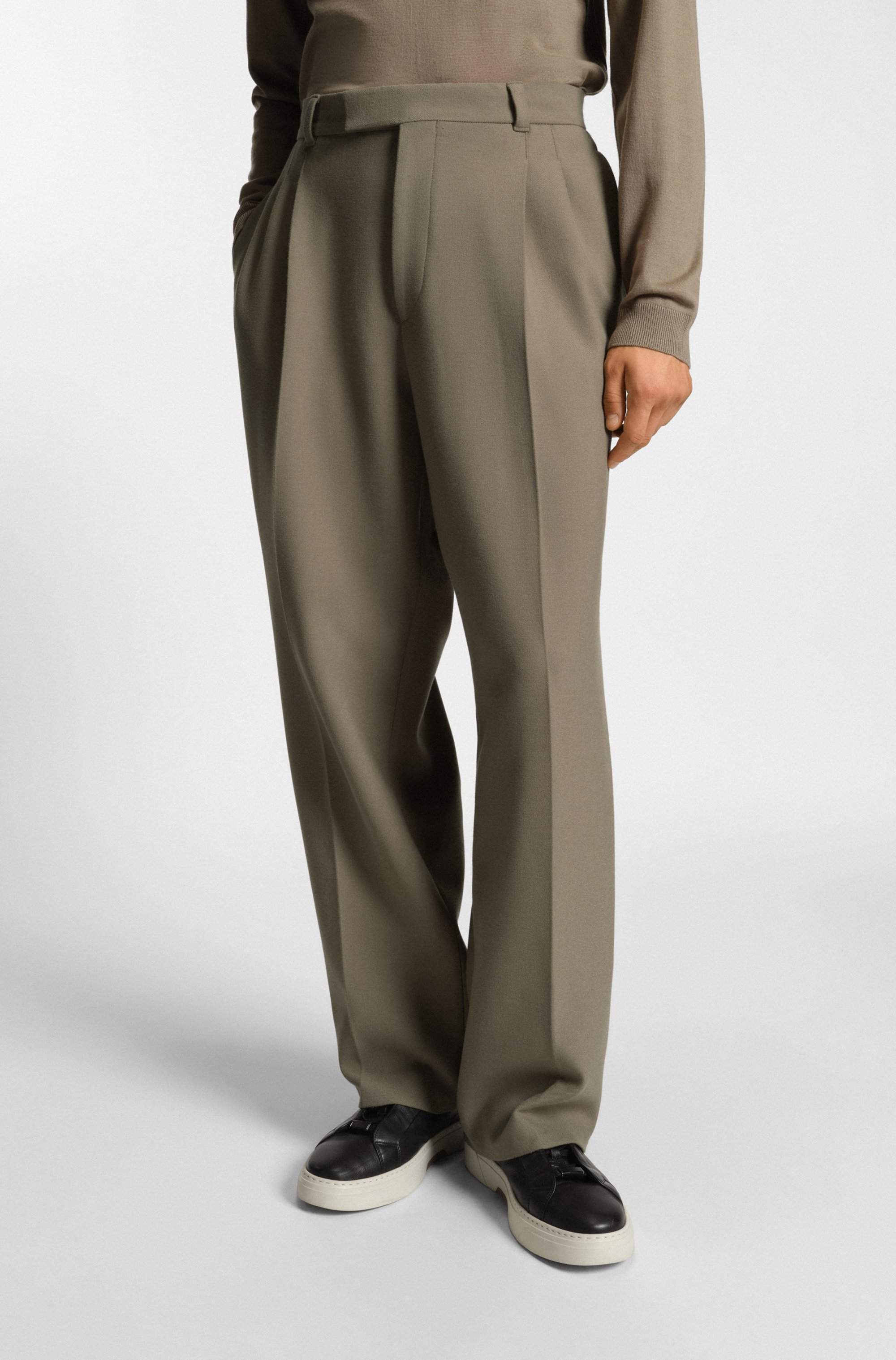 Relaxed-fit trousers with double pleat