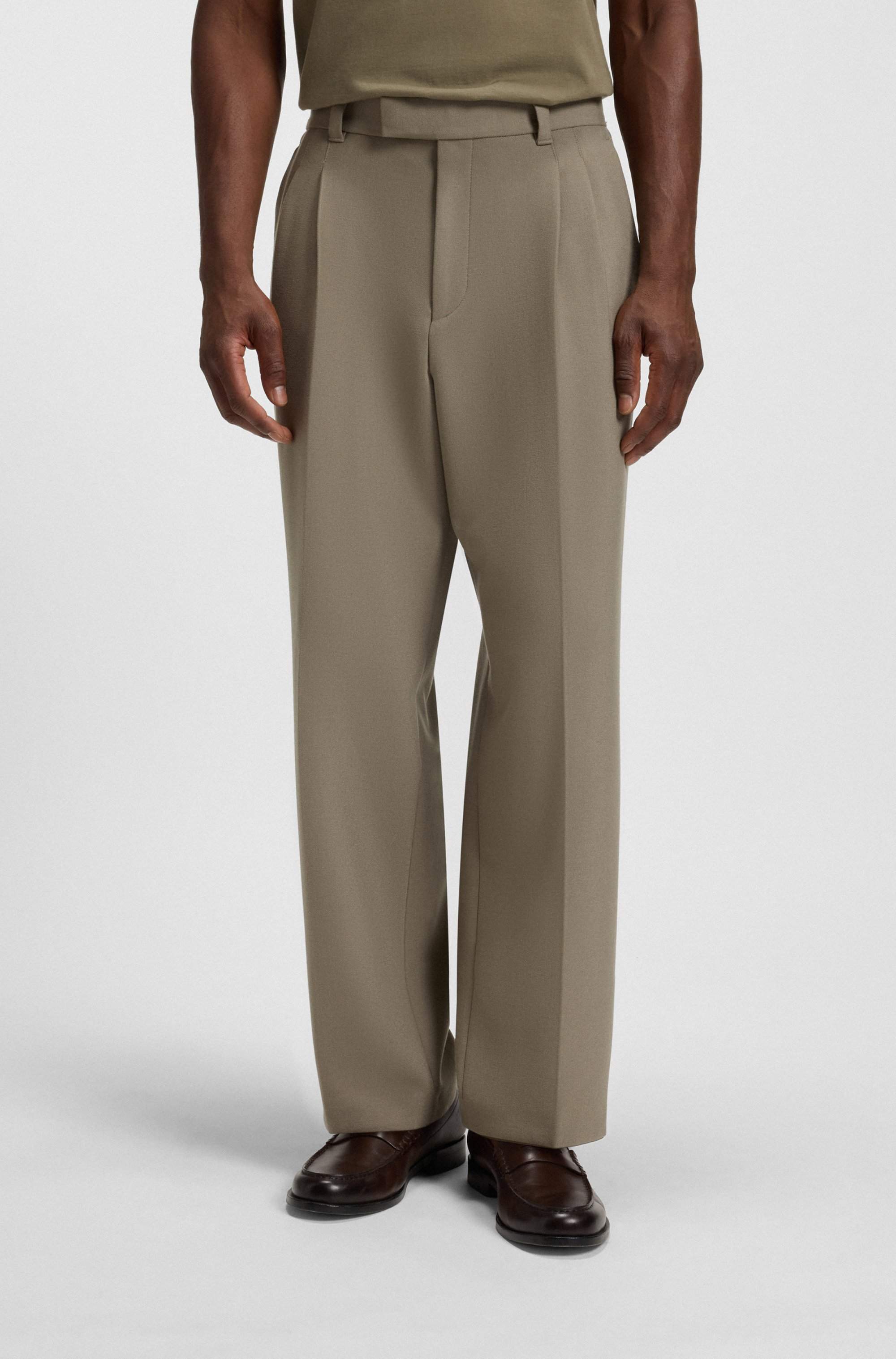 Relaxed-fit trousers with double pleat