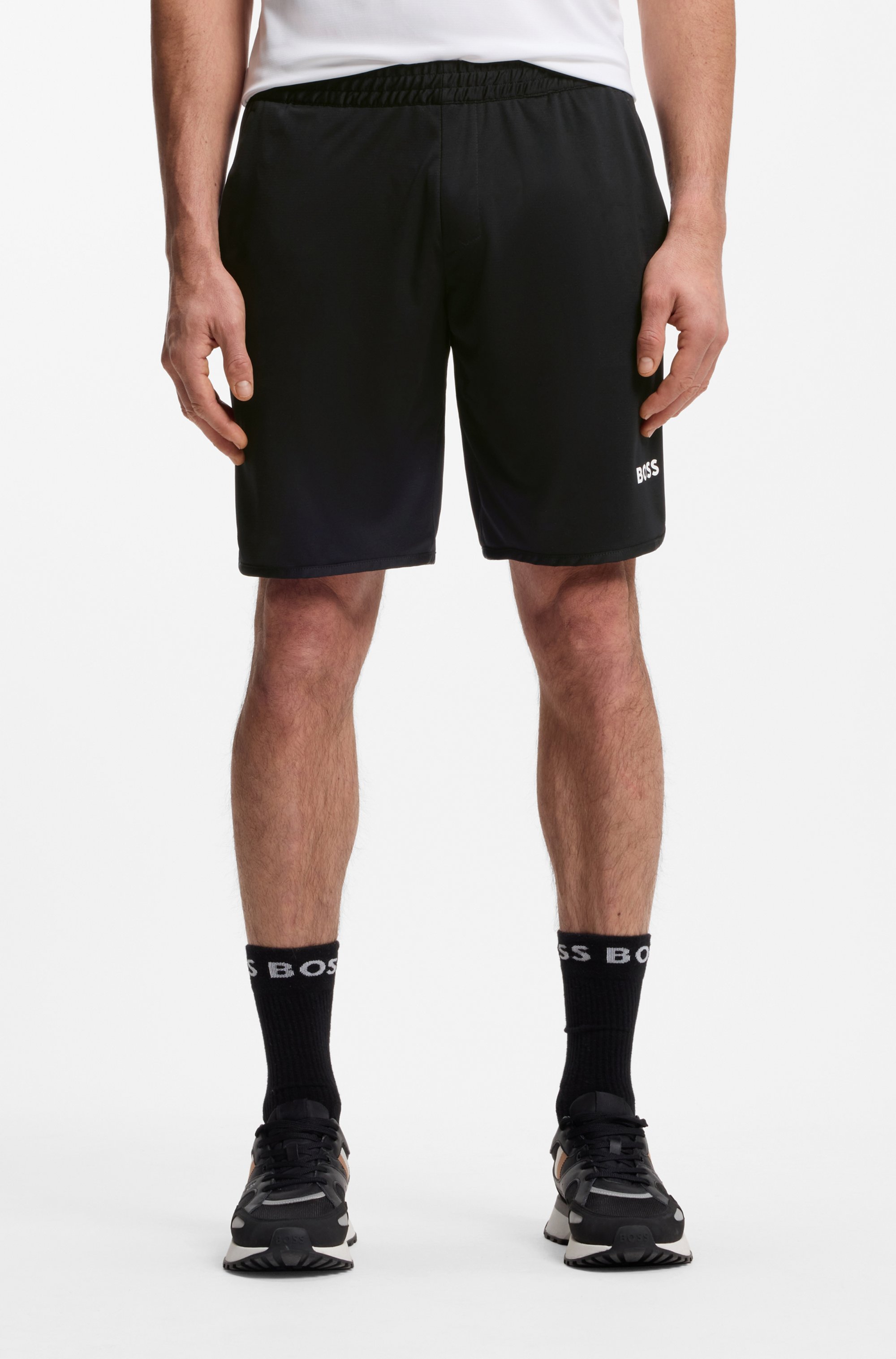 Quick-dry shorts in stretch fabric with pocket bags