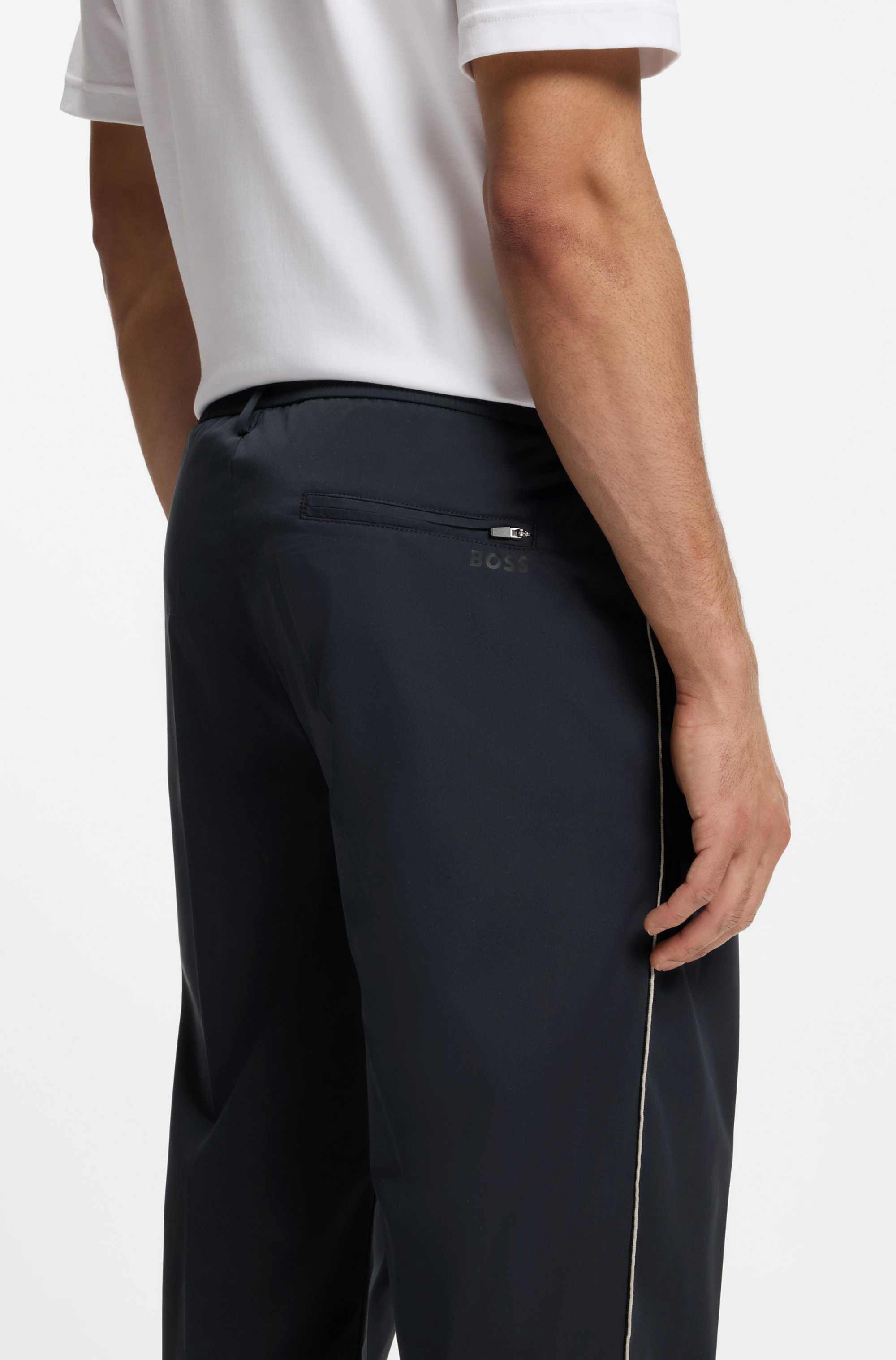 Tapered-fit trousers with water-repellent finish