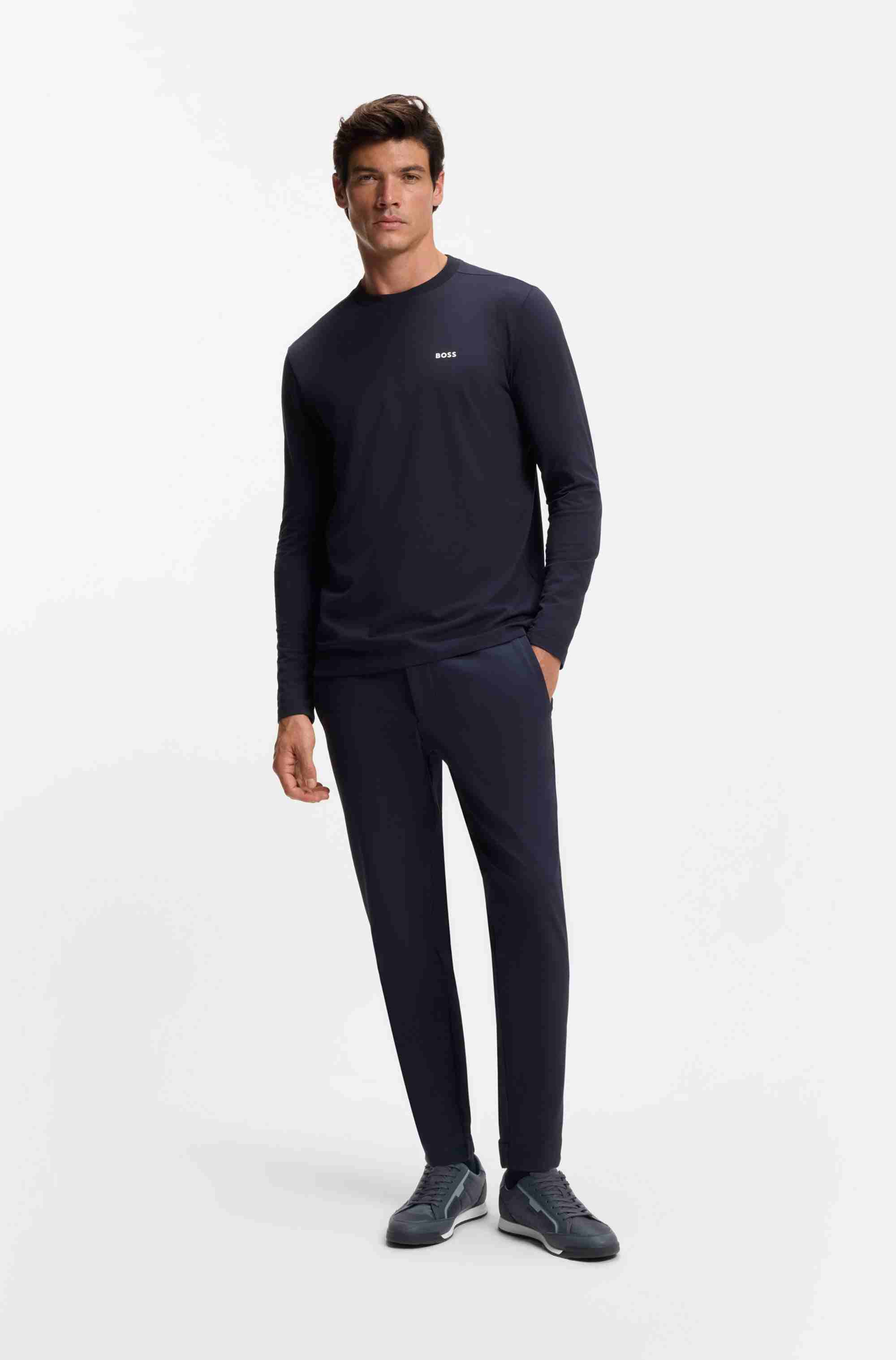 Mixed-material trainers with contrast back tab