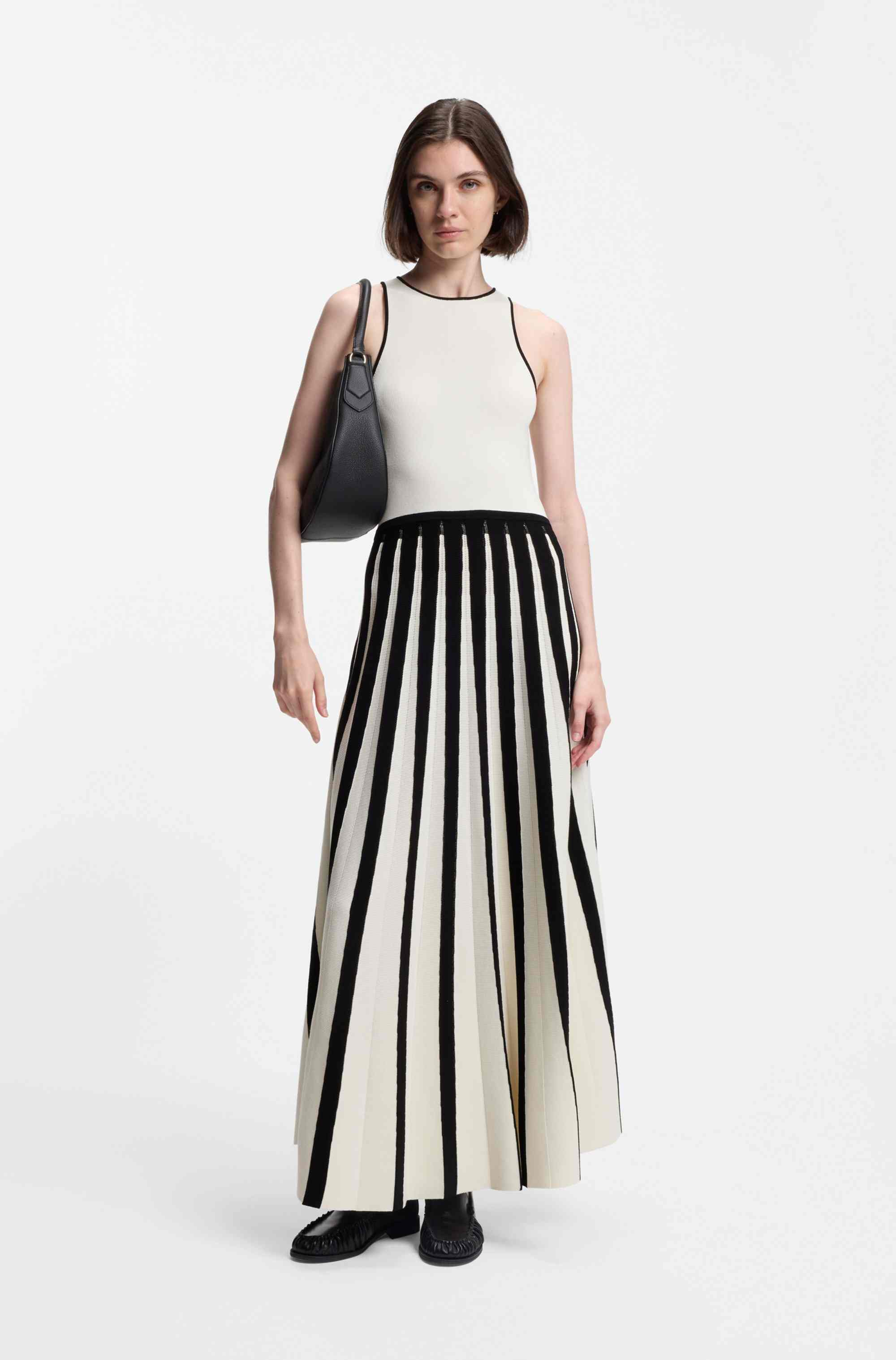 Knitted dress with two-tone pleated skirt