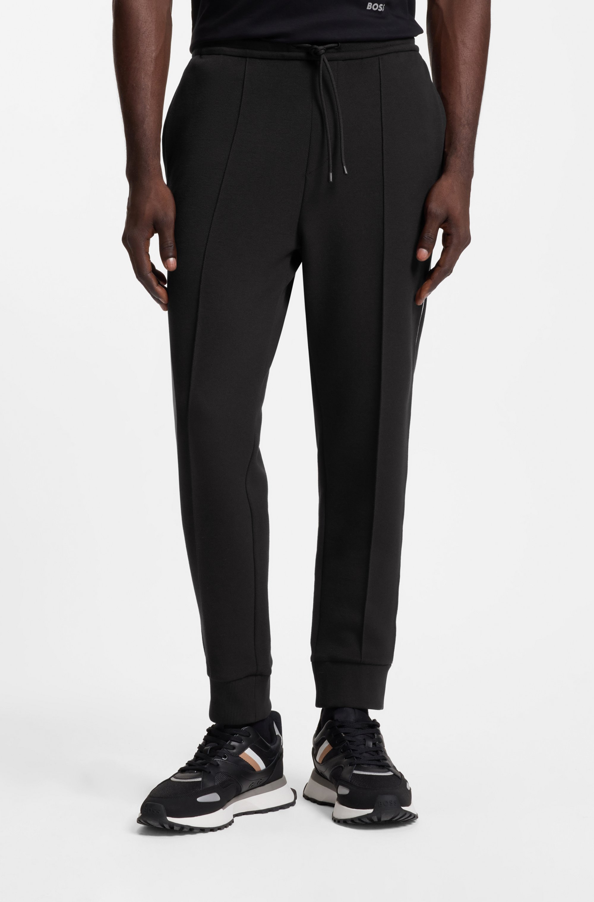 Cotton-blend tracksuit bottoms with piping details