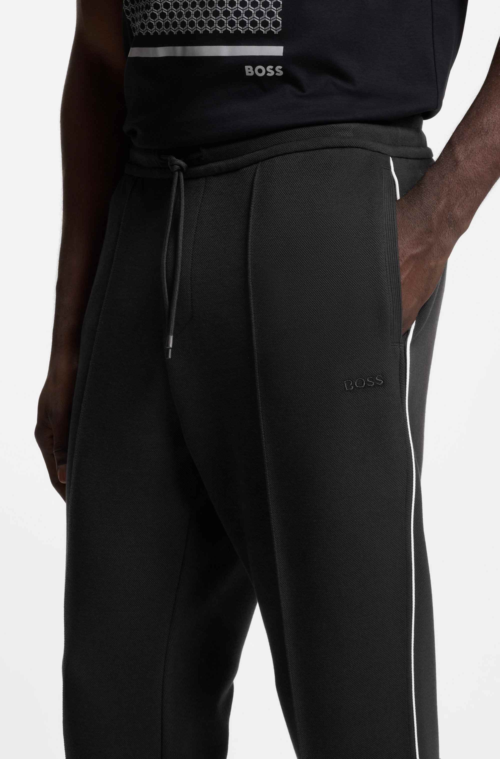 Cotton-blend tracksuit bottoms with piping details