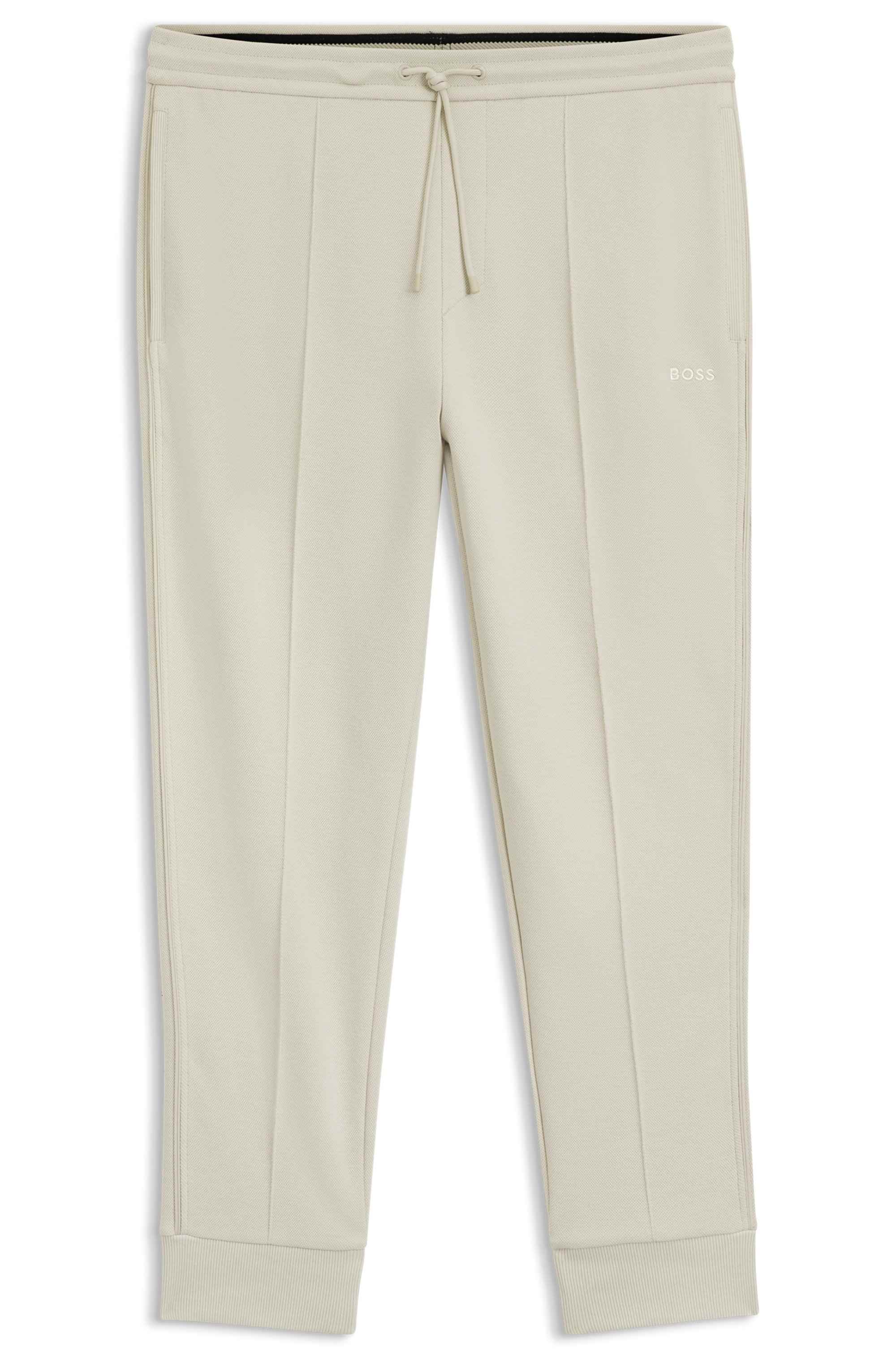 Cotton-blend tracksuit bottoms with piping details