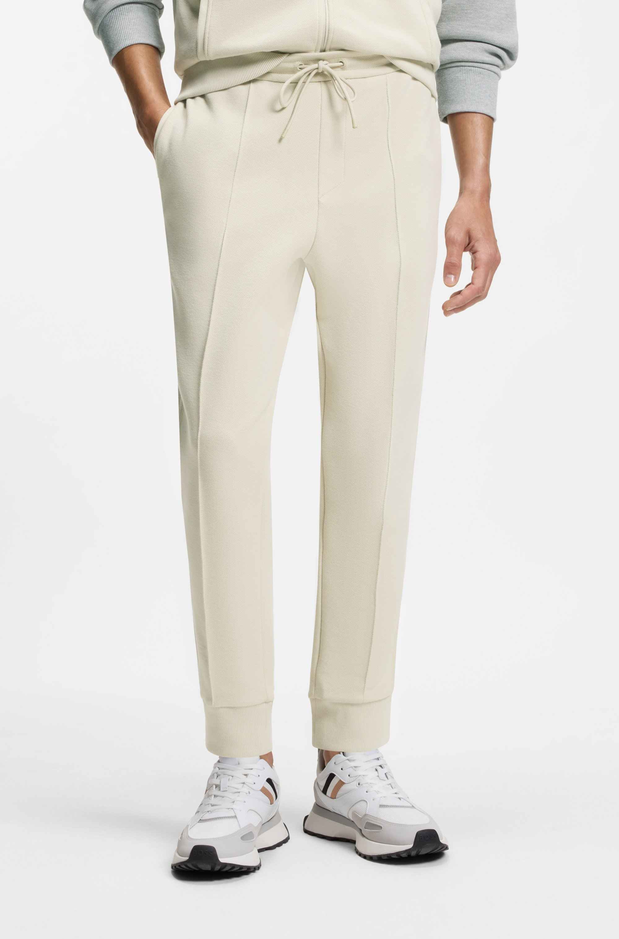 Cotton-blend tracksuit bottoms with piping details
