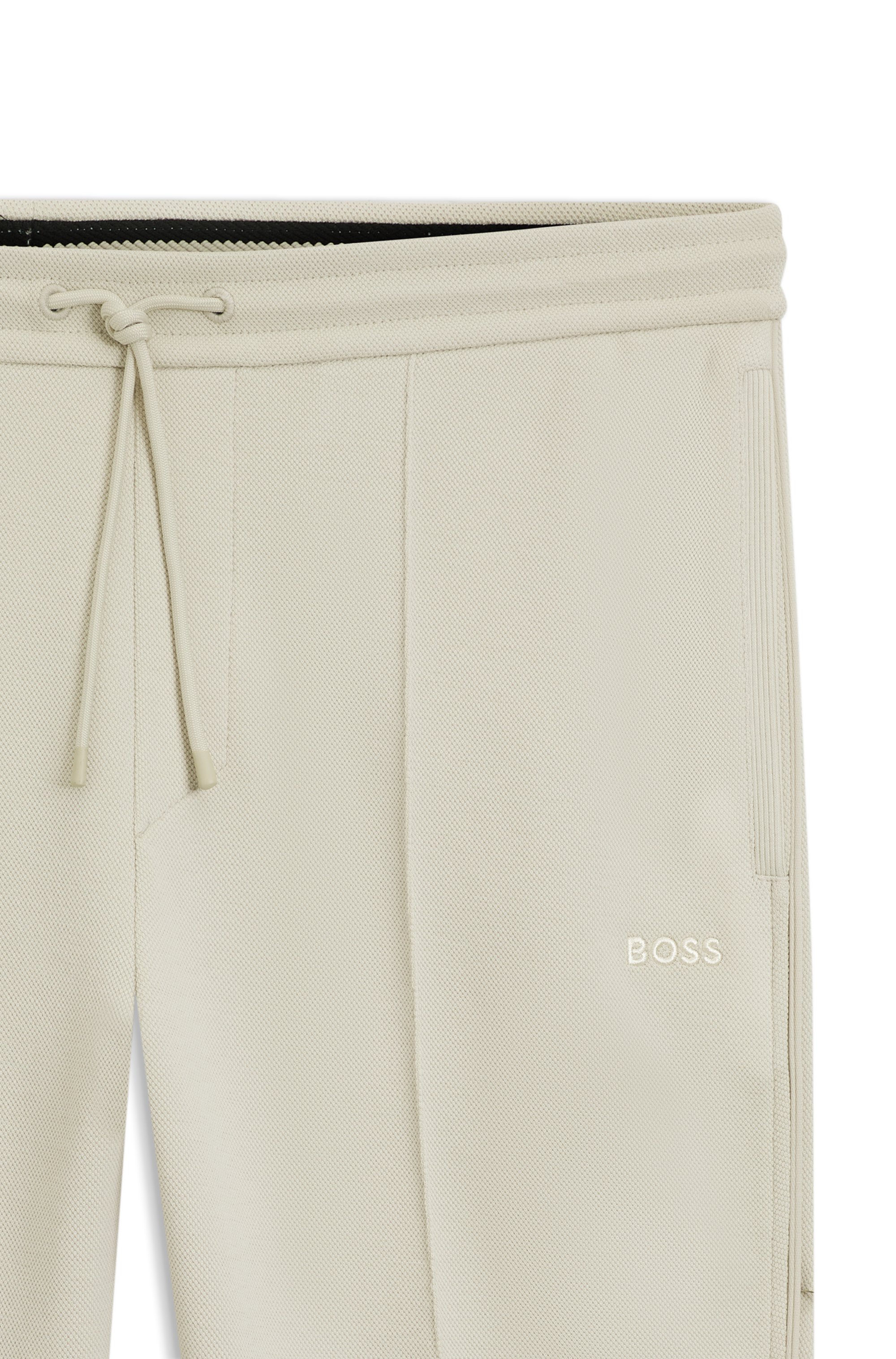 Cotton-blend tracksuit bottoms with piping details
