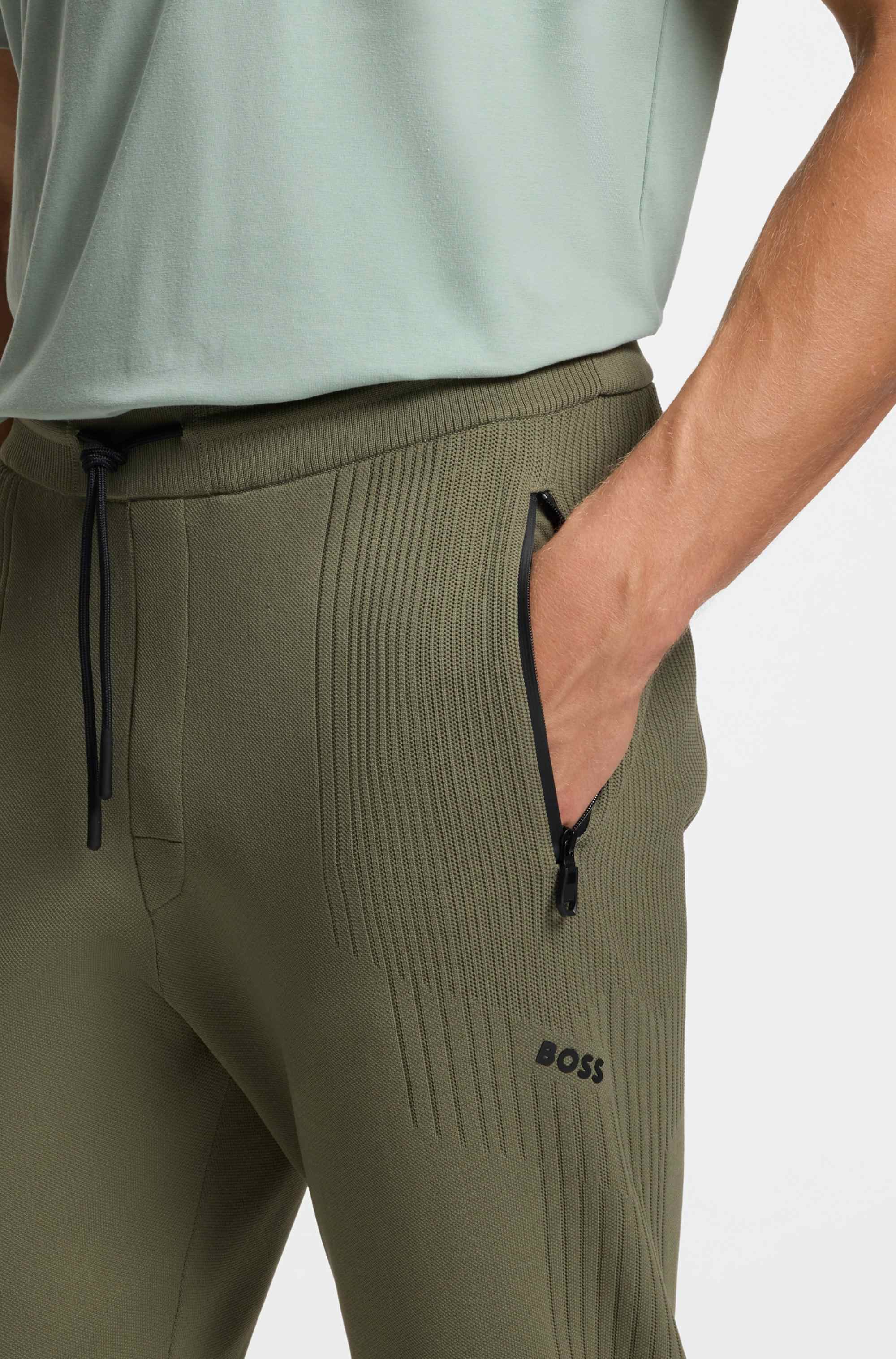 Active Regular-fit tracksuit bottoms with jacquard stripes