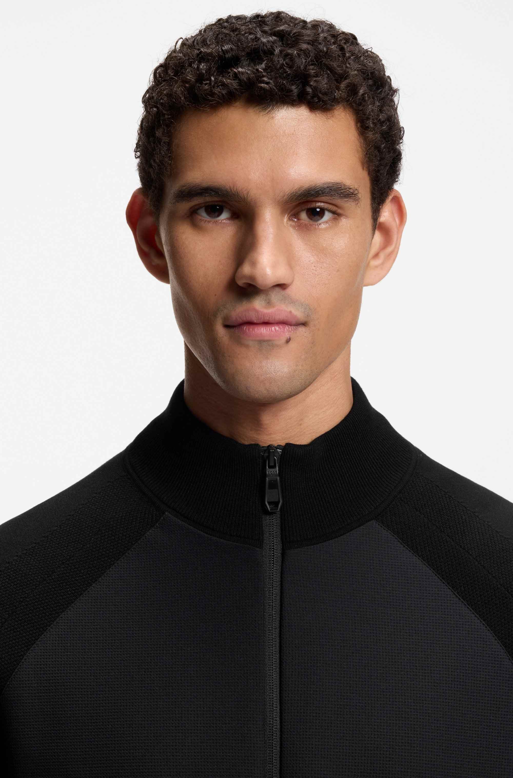 Knitted hybrid jacket with waffle fabric