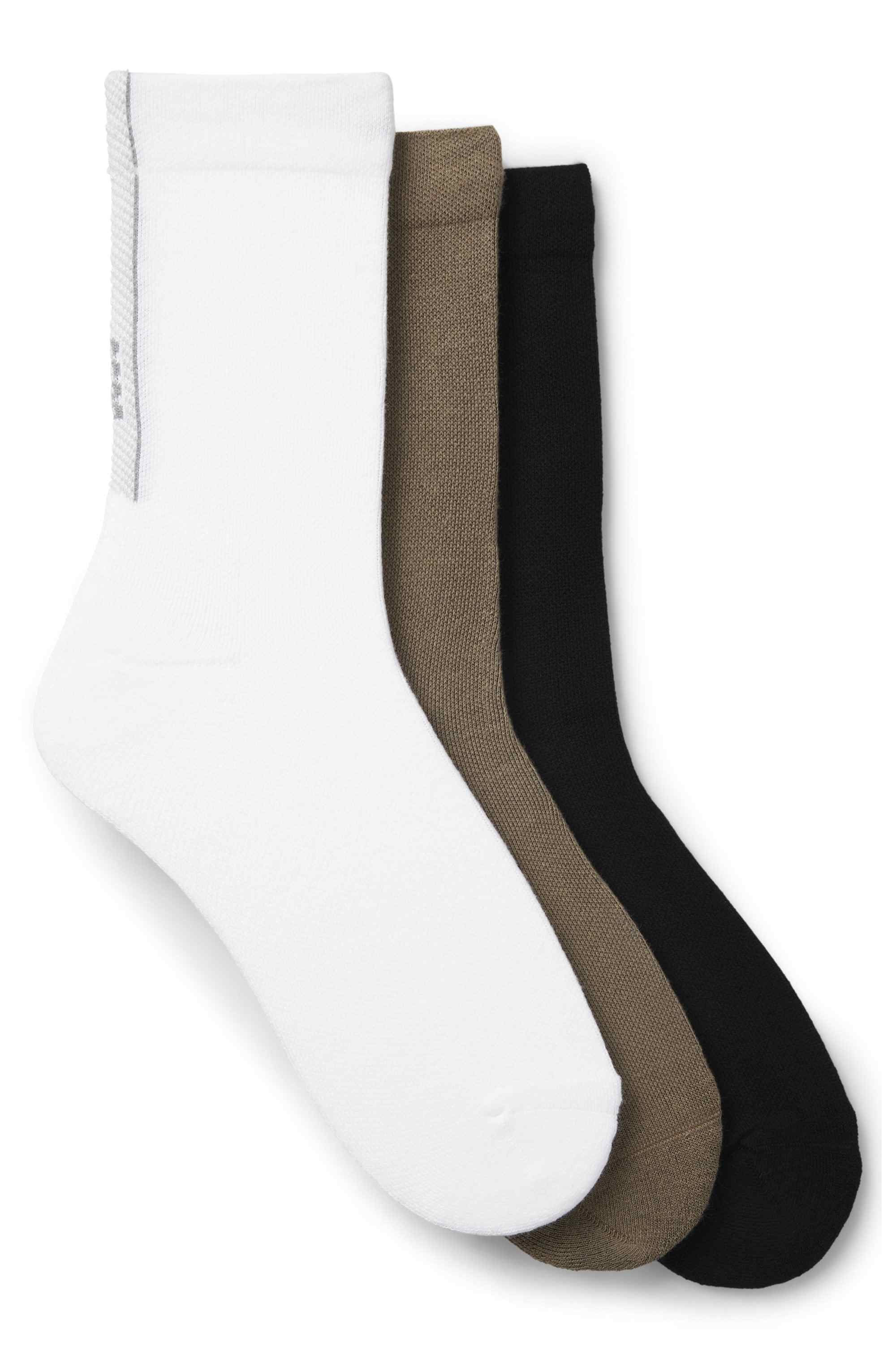 Three-pack of regular-length socks with structured tape