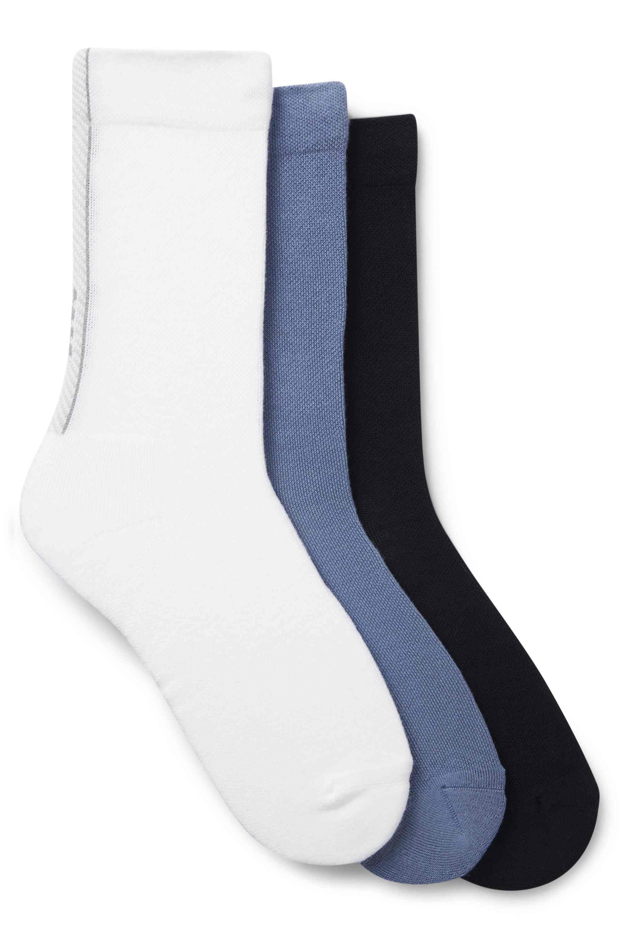 Three-pack of regular-length socks with structured tape