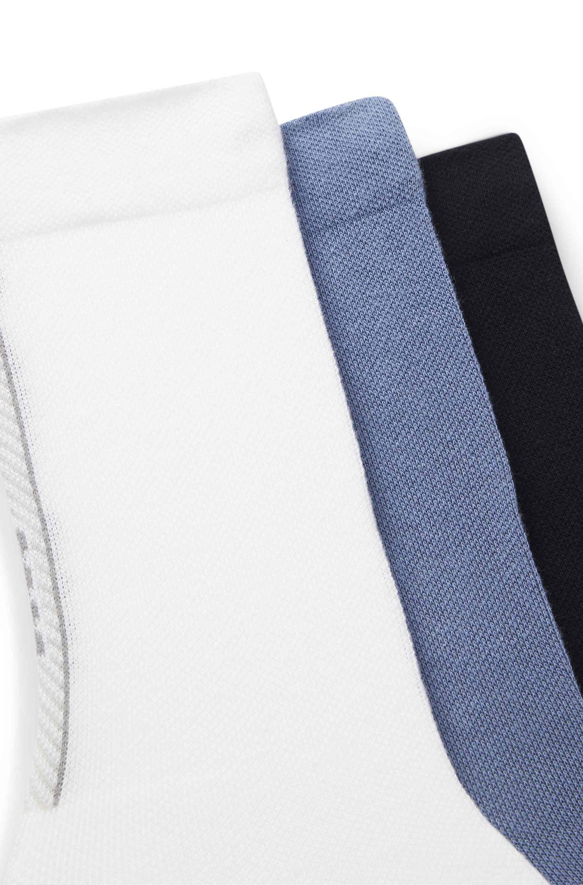 Three-pack of regular-length socks with structured tape