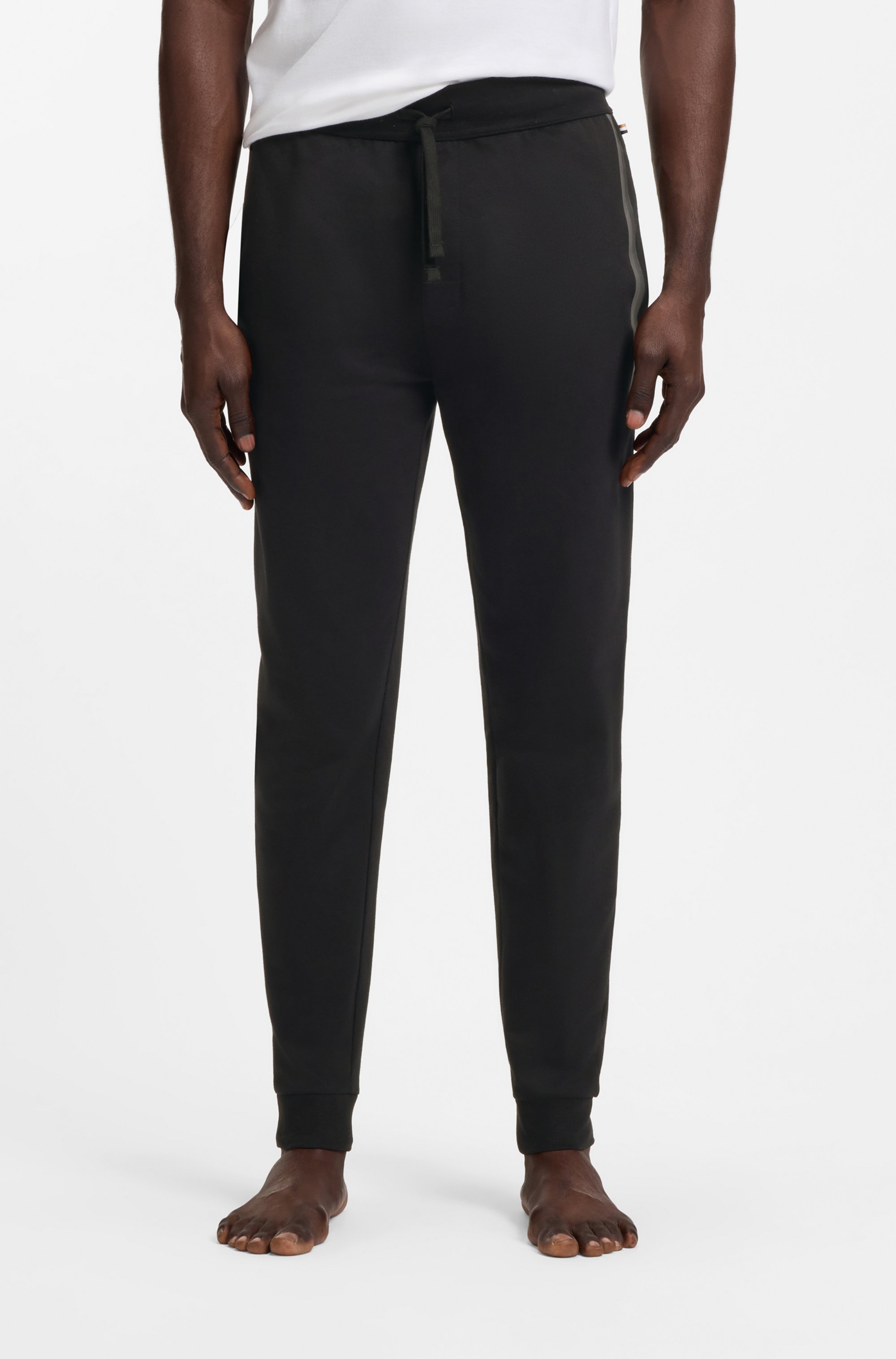 Cotton-terry tracksuit bottoms with stripes and logo