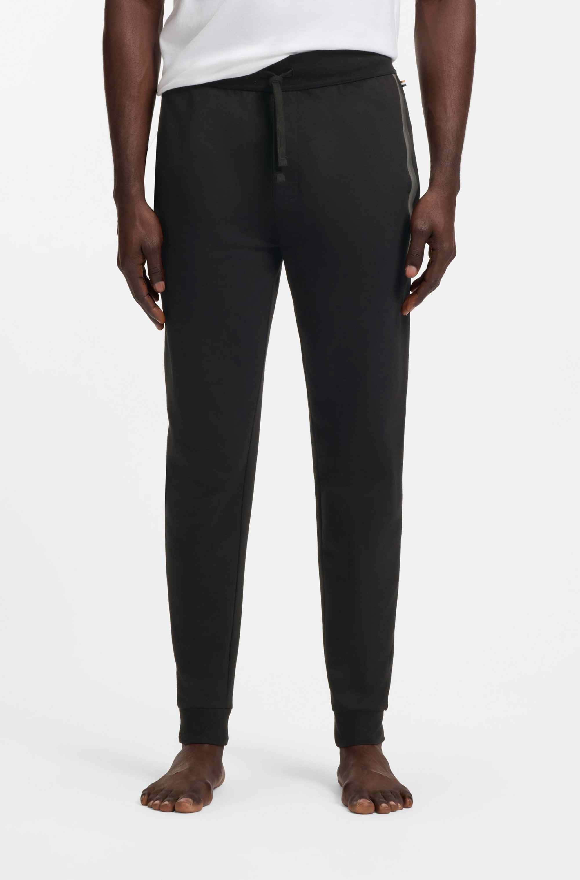 Cotton-terry tracksuit bottoms with stripes and logo