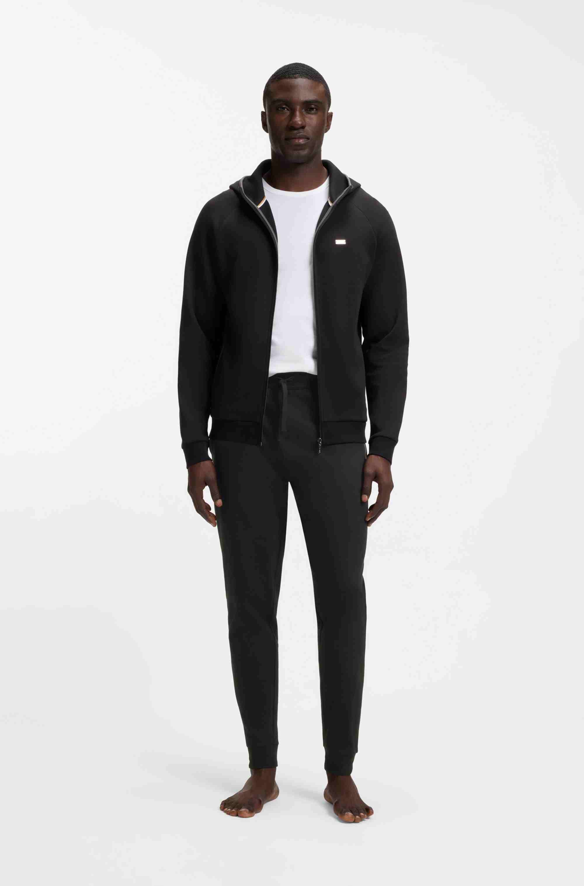 Cotton-terry tracksuit bottoms with stripes and logo