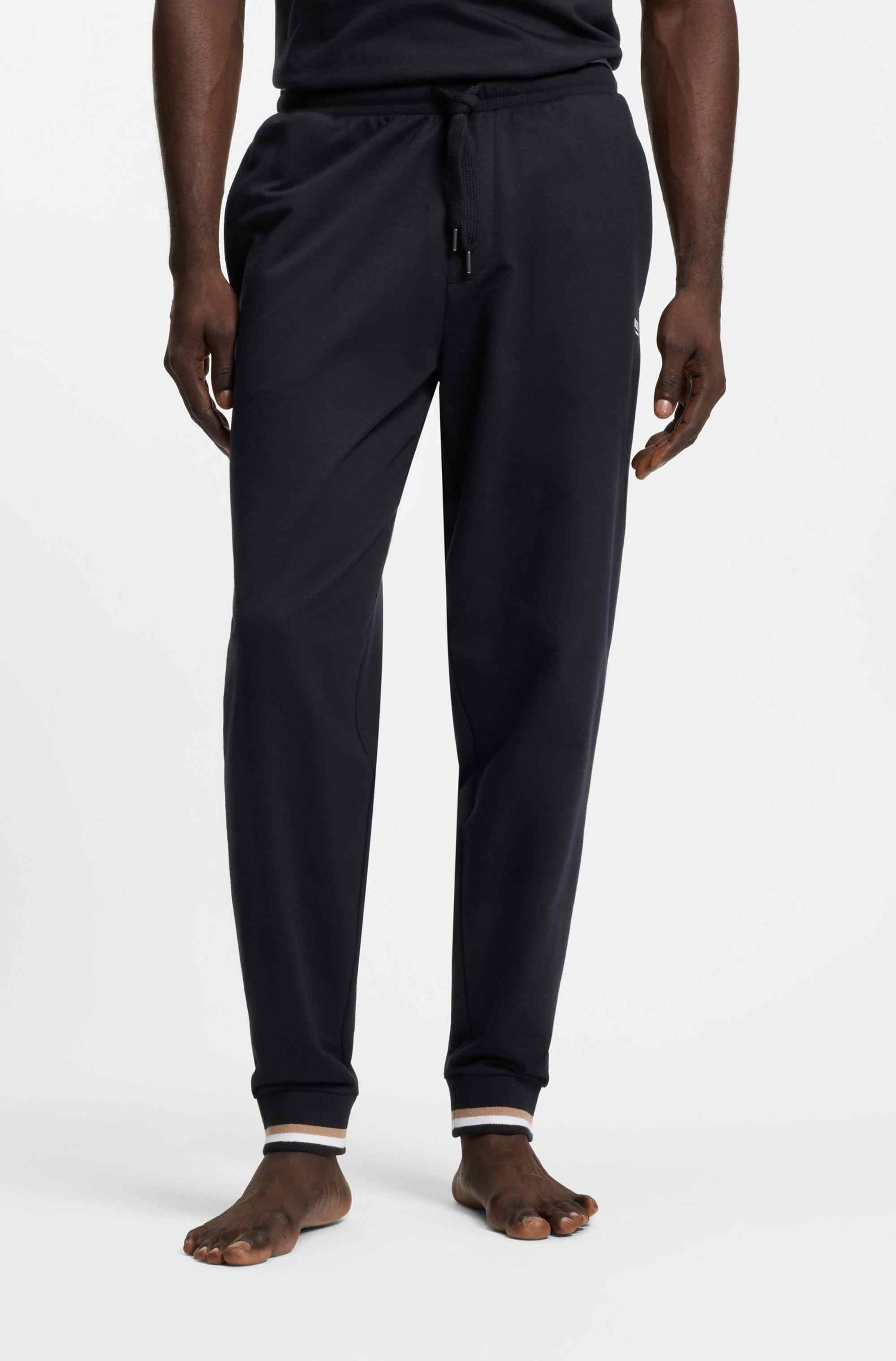 Cotton-terry tracksuit bottoms with logo and signature stripes