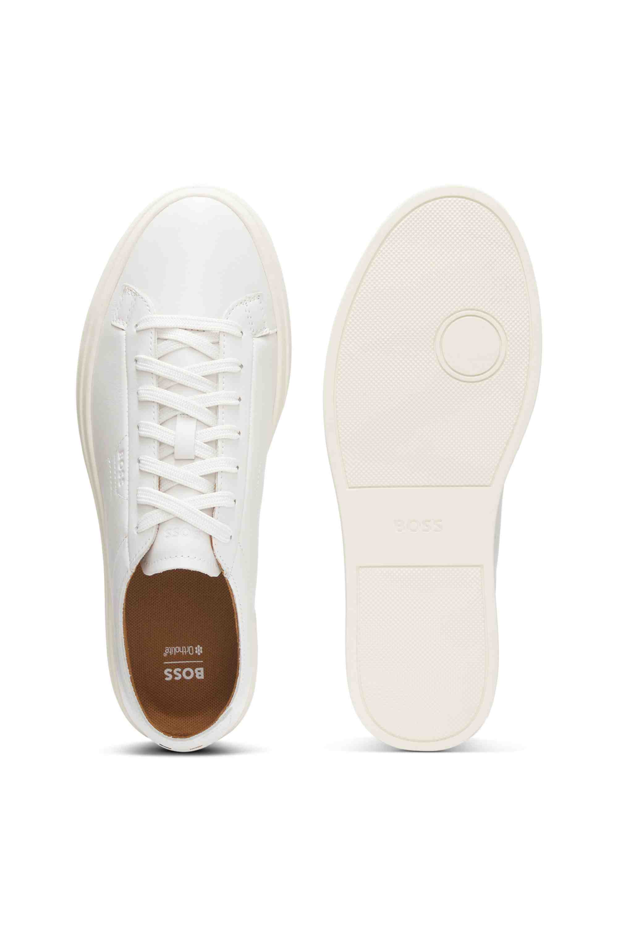 Low-top trainers in leather with embossed logo