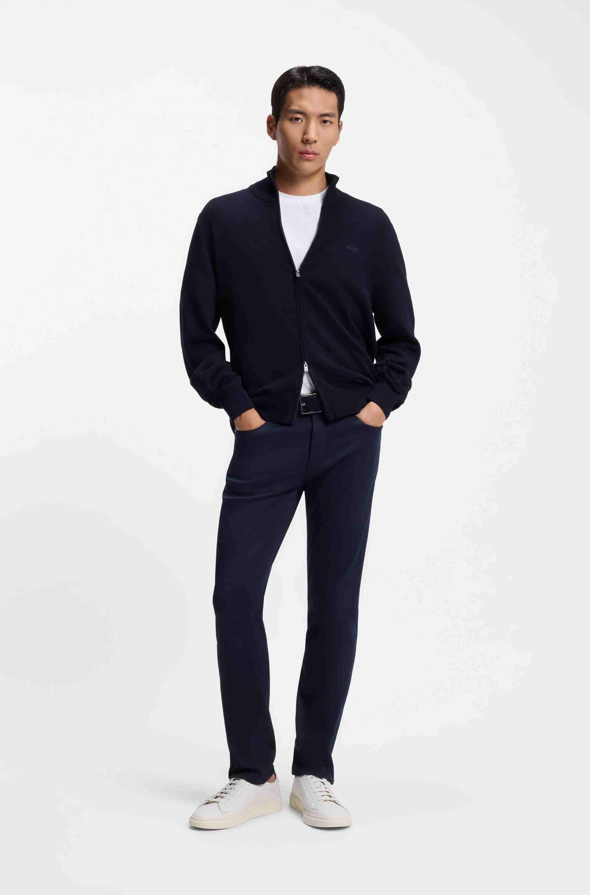 Low-top trainers in leather with embossed logo