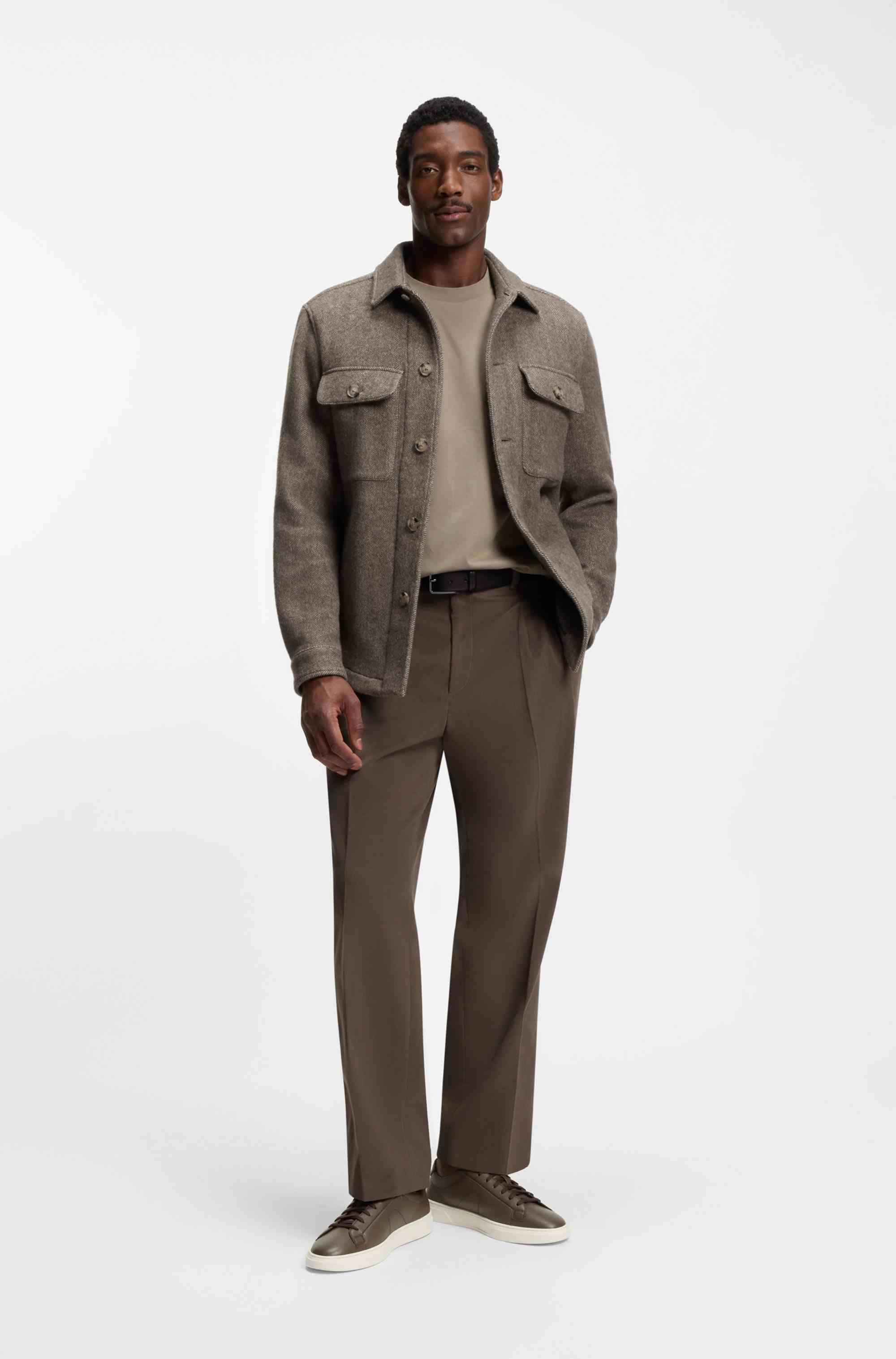 Low-top trainers in leather with embossed logo