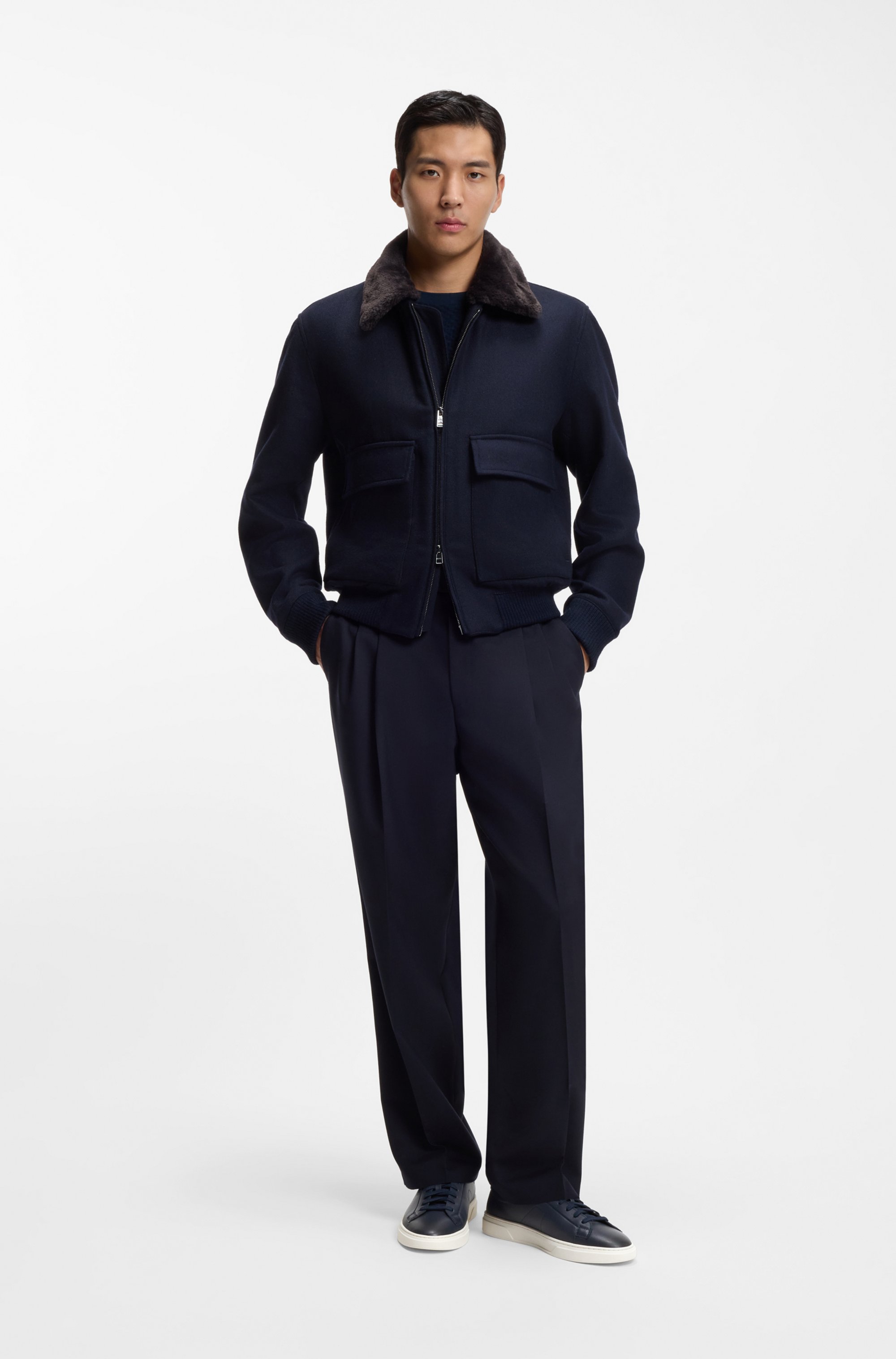 Low-top trainers in leather with embossed logo