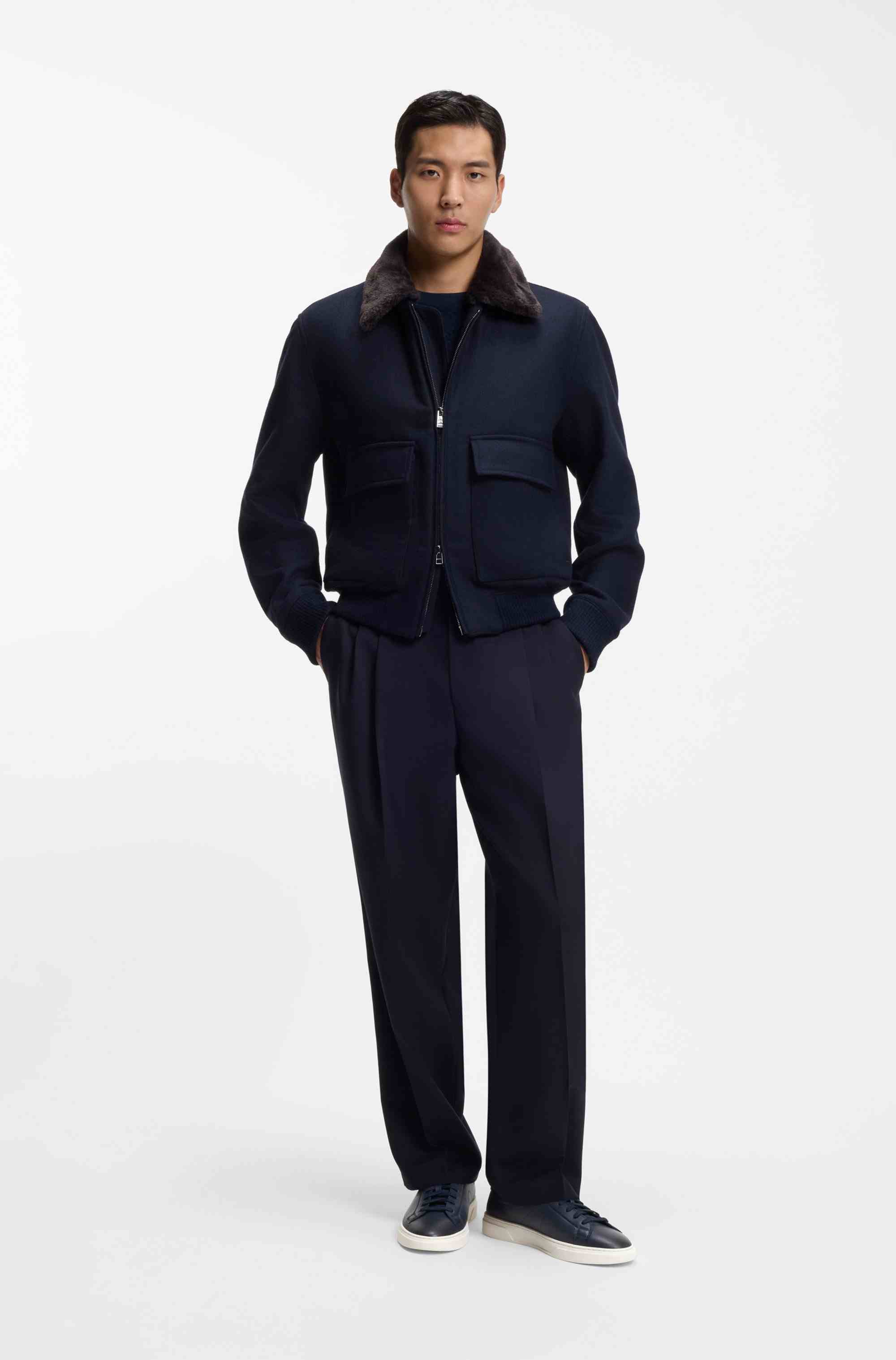 Low-top trainers in leather with embossed logo