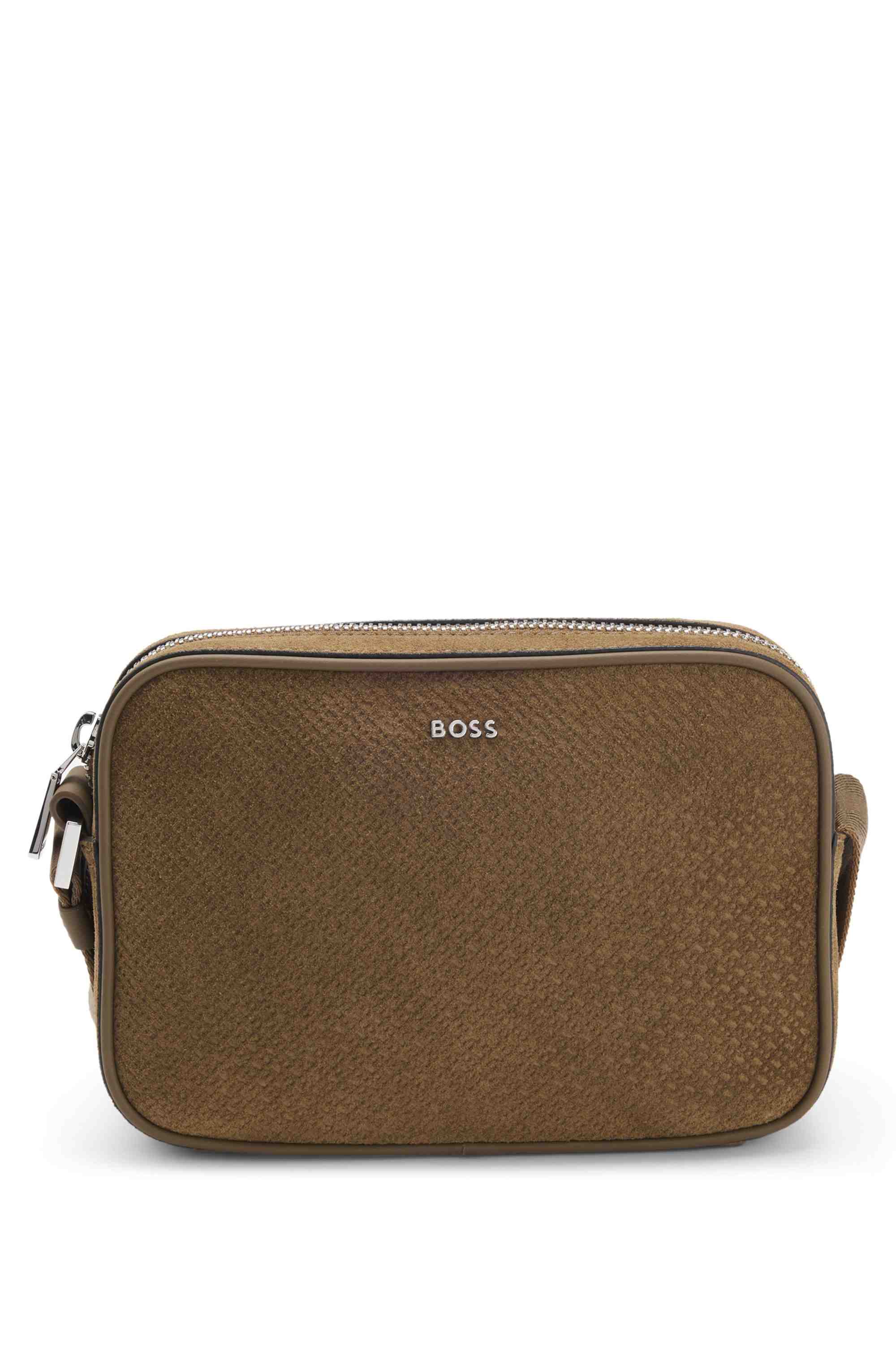 Crossbody bag in monogram-embossed suede