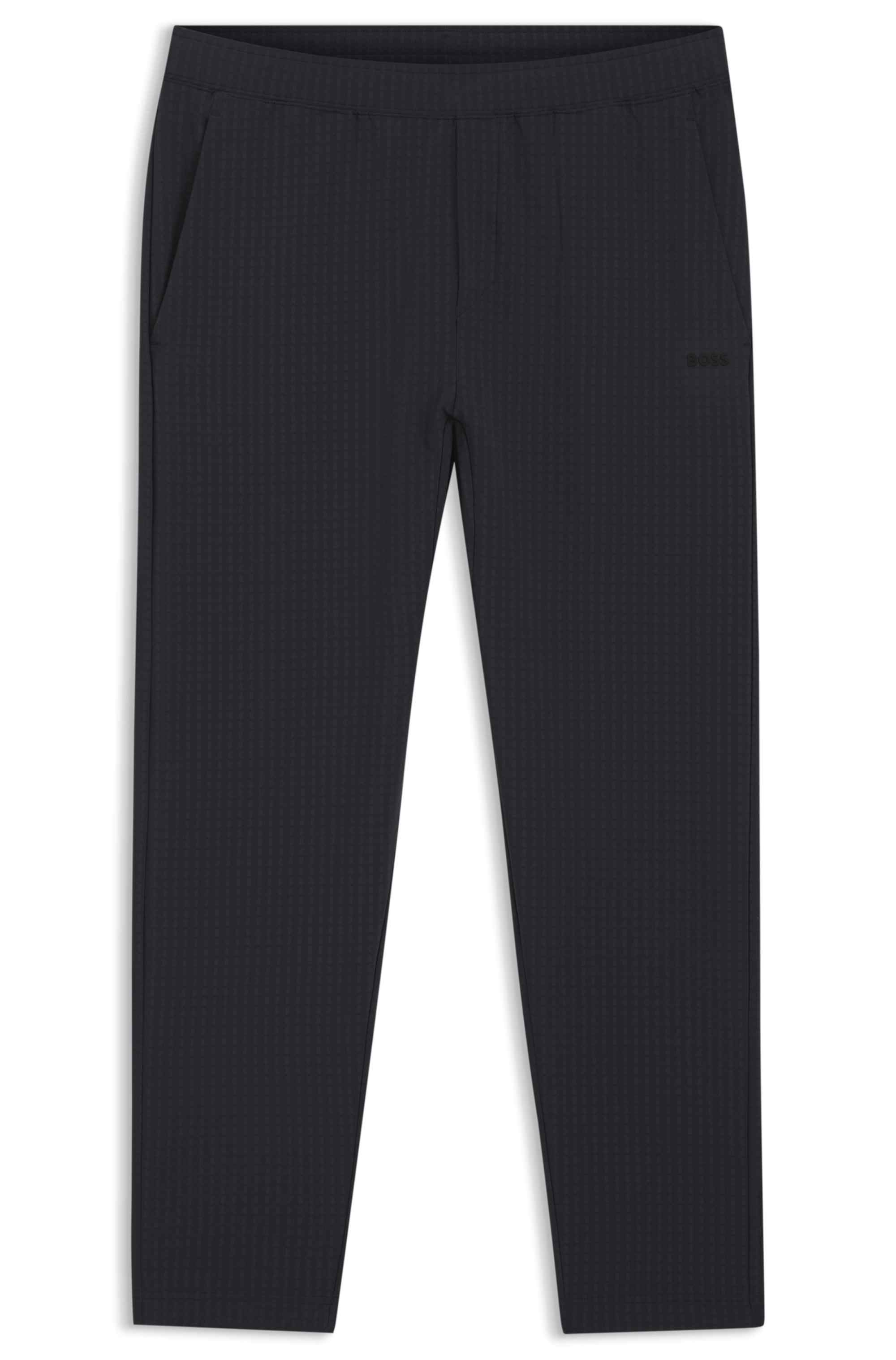 Drawstring trousers in stretch waffle fabric with framed zip