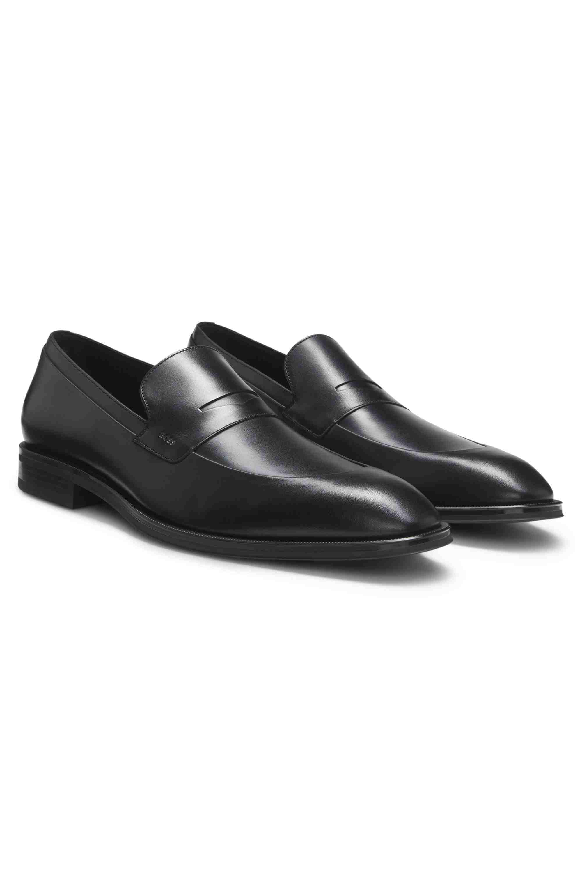 Leather loafers with penny-style trim