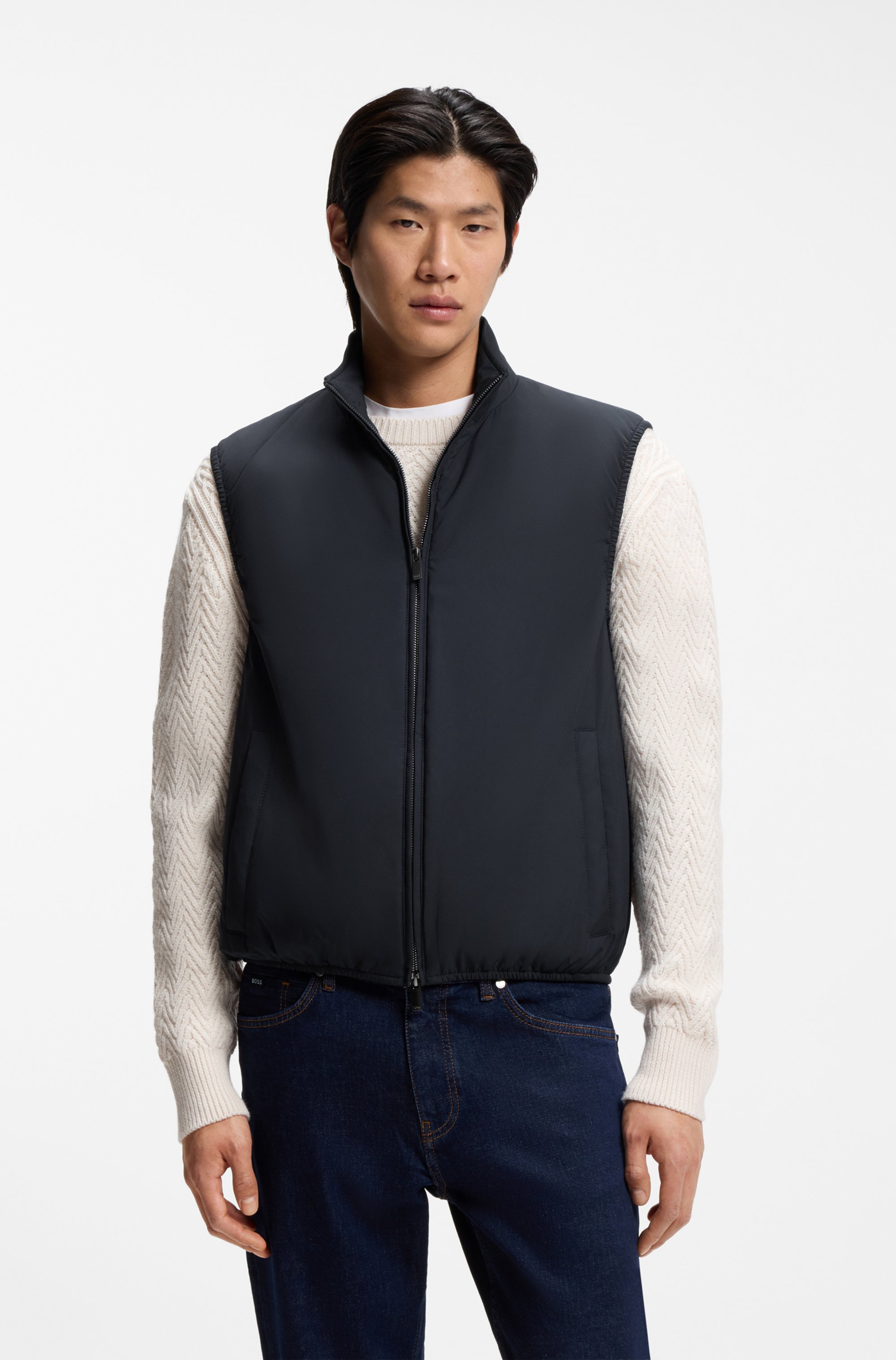 Water-repellent gilet with knitted trims